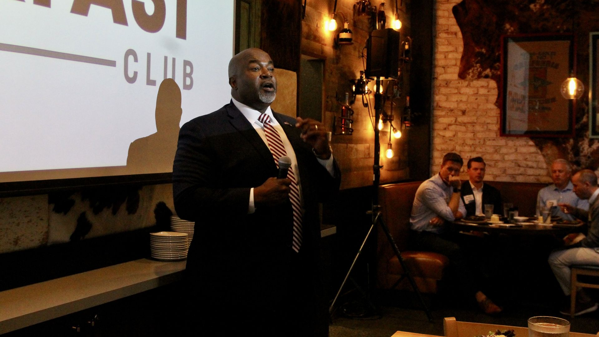 Mark Robinson speaks inside restaurant