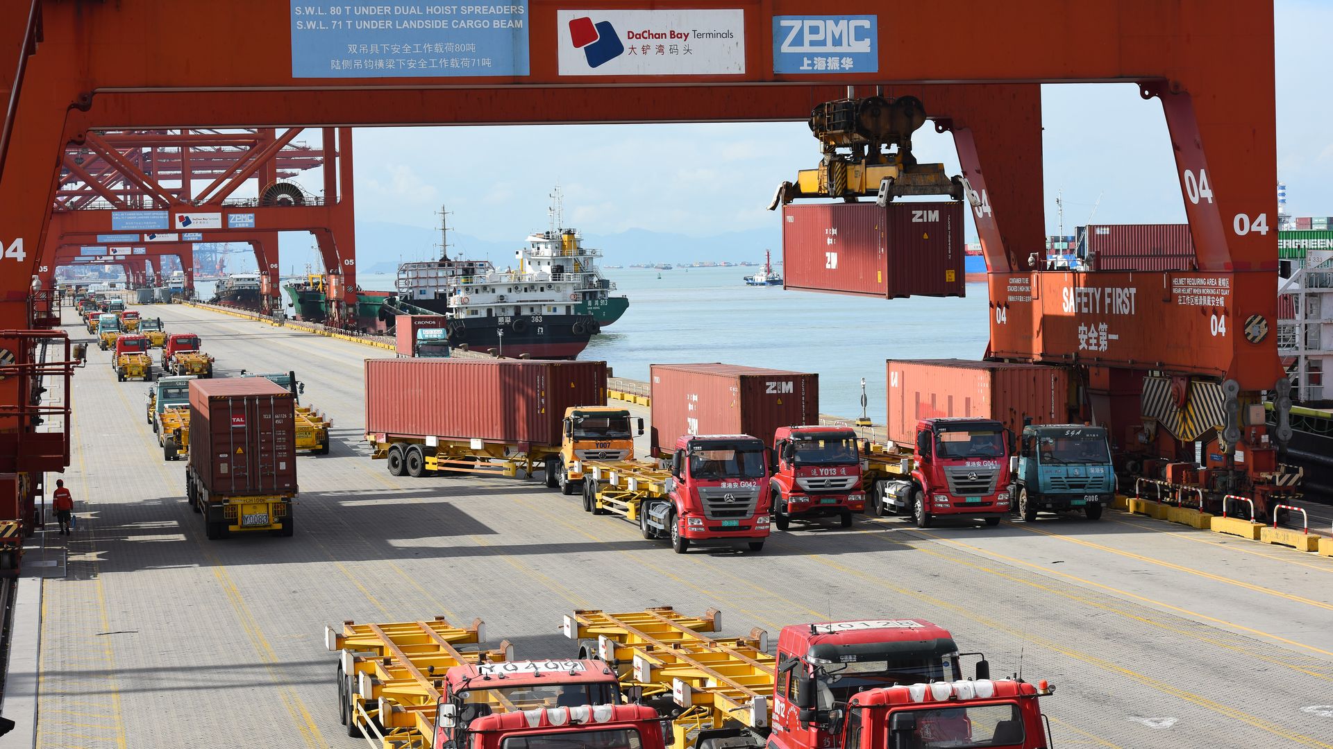Trucks transport containers at Dachan Bay Terminals in Shenzhen, Guangdong Province of China. Photo by VCG