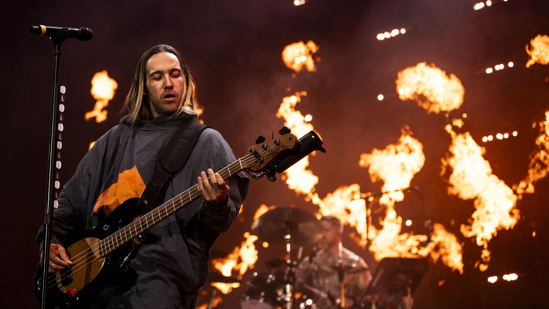 Fall Out Boy bassist Pete Wentz performs on stage. 