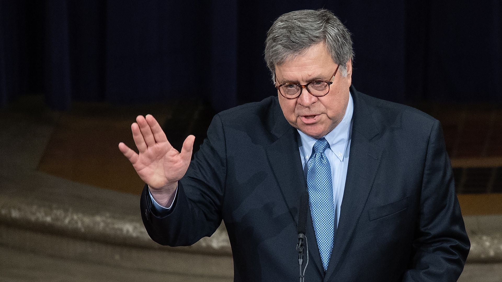 Attorney General Bill Barr waves before addressing the Department of Justice National Opioid Summit in Washington, DC, on March 6