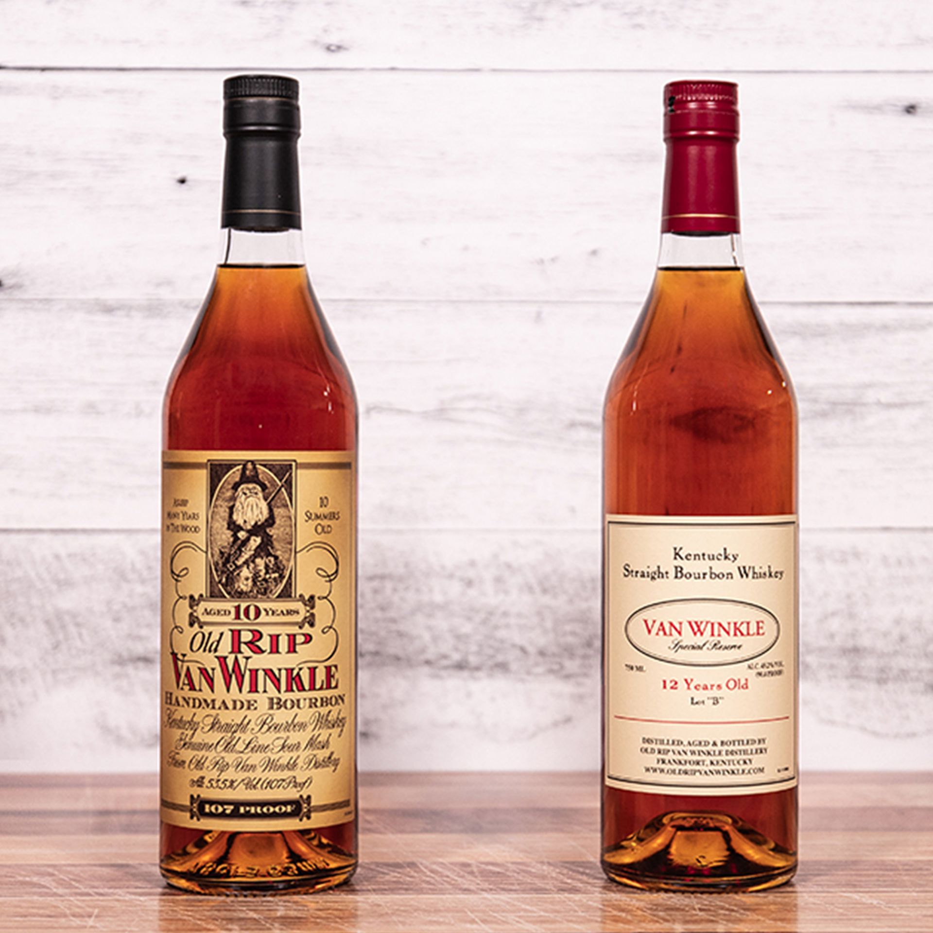 Photo shows two bottles of Pappy Van Winkle bourbon: Old Rip Van Winkle 10 Year on left, Van Winkle Special Reserve Bourbon 12 Year on right 