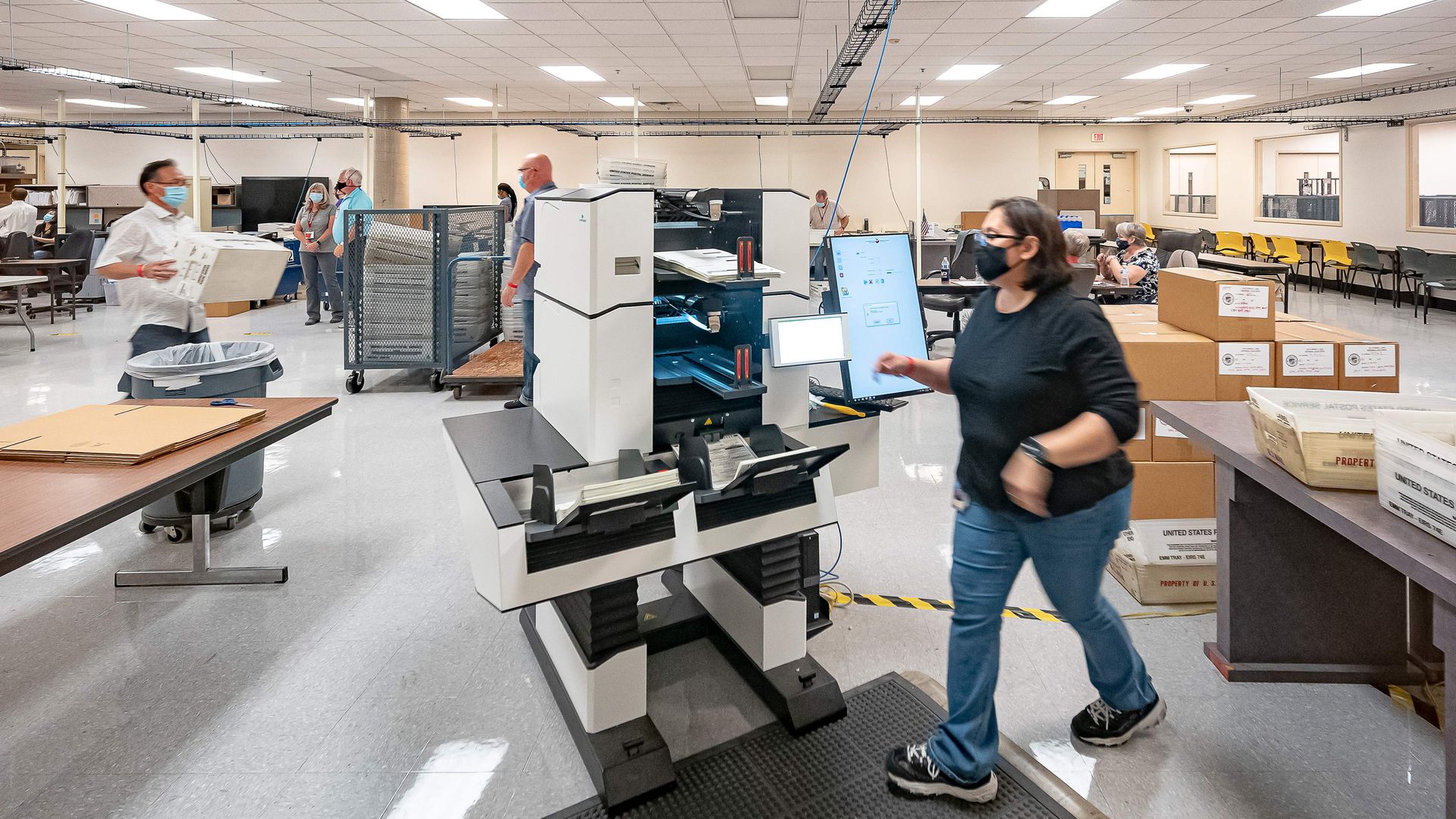 Ballots are counted at the Maricopa County Election Department