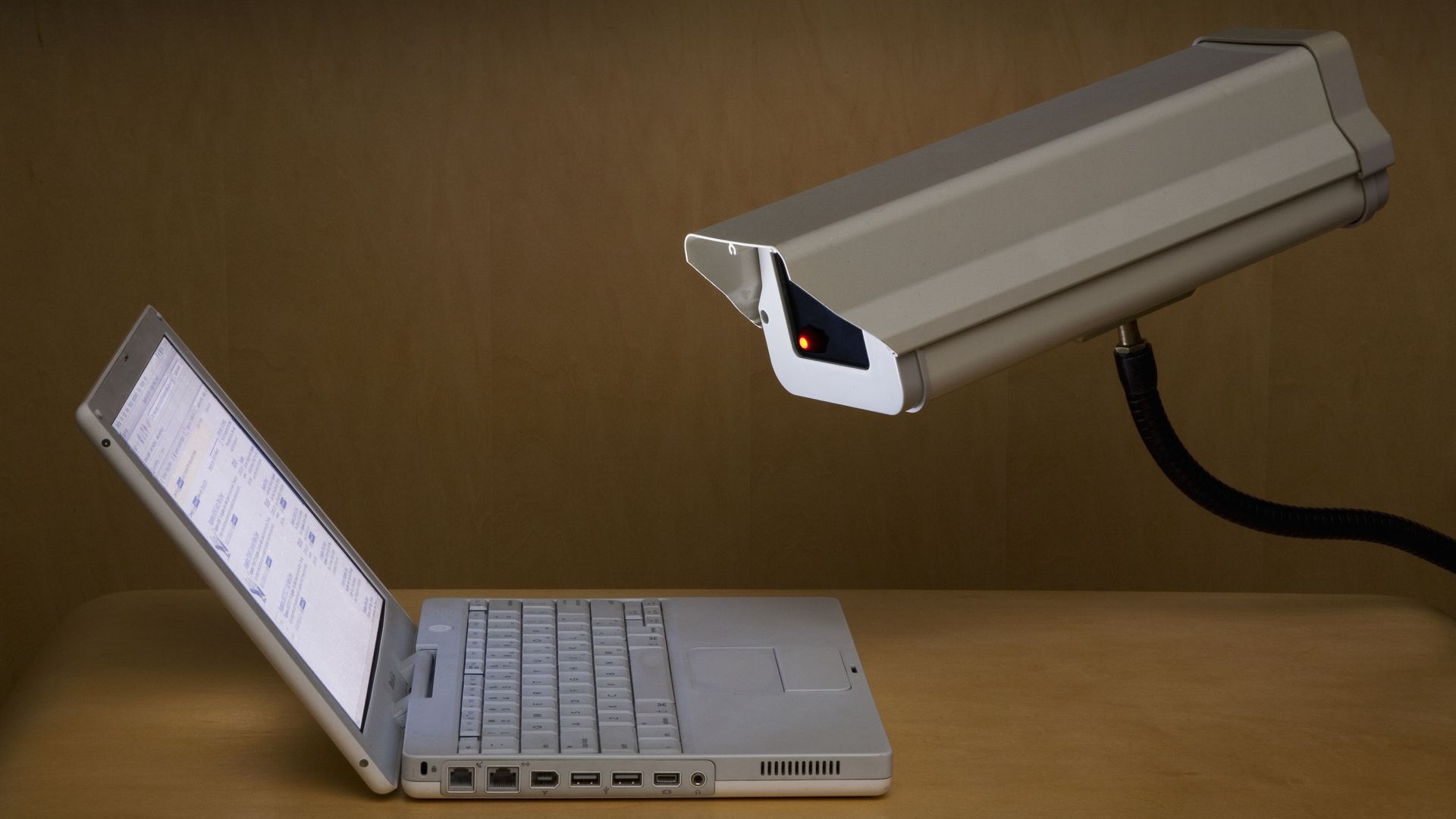 A surveillance camera watching a laptop screen