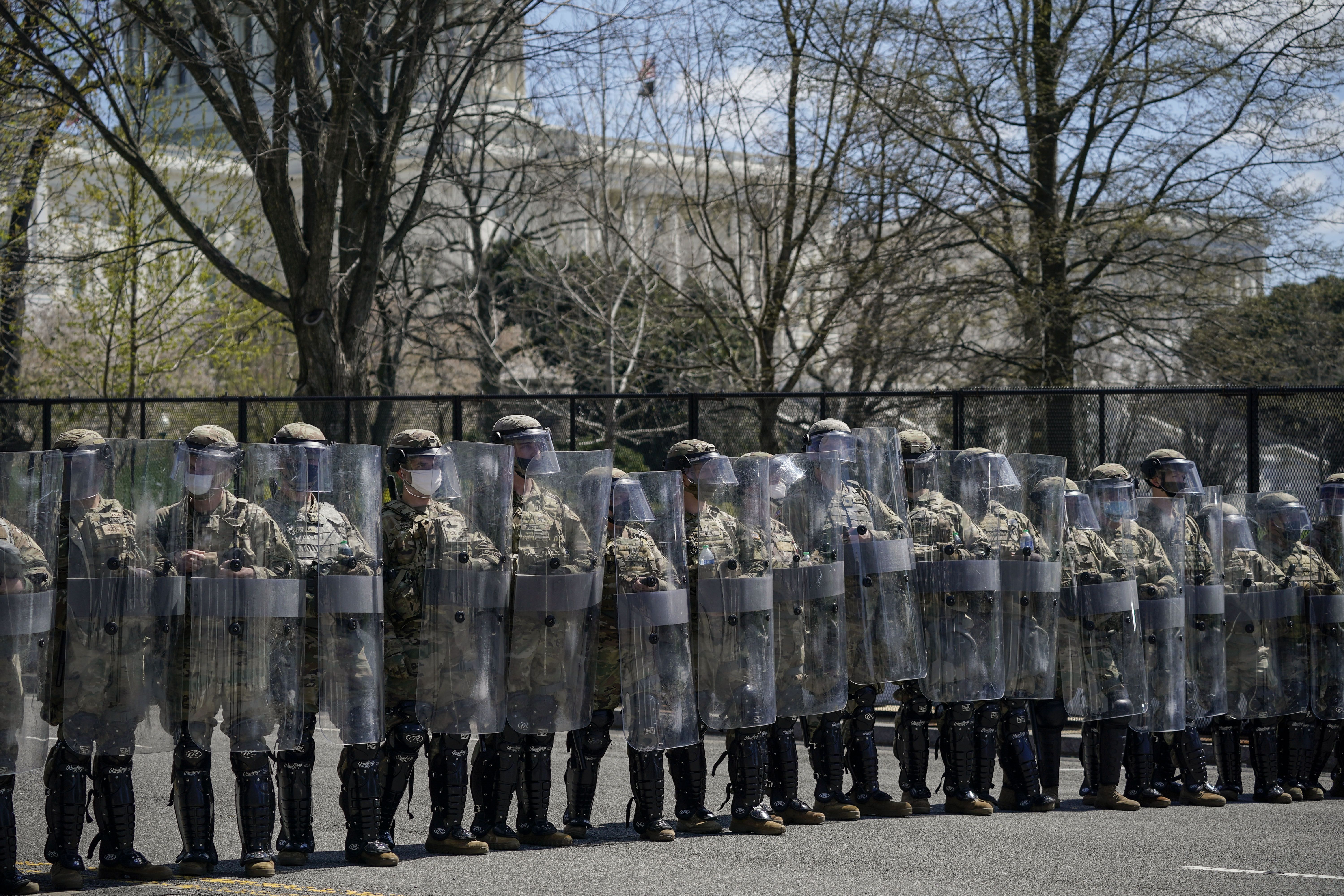National Guard members standing guard on Constitution Avenue near the U.S. Capitol on April 2.