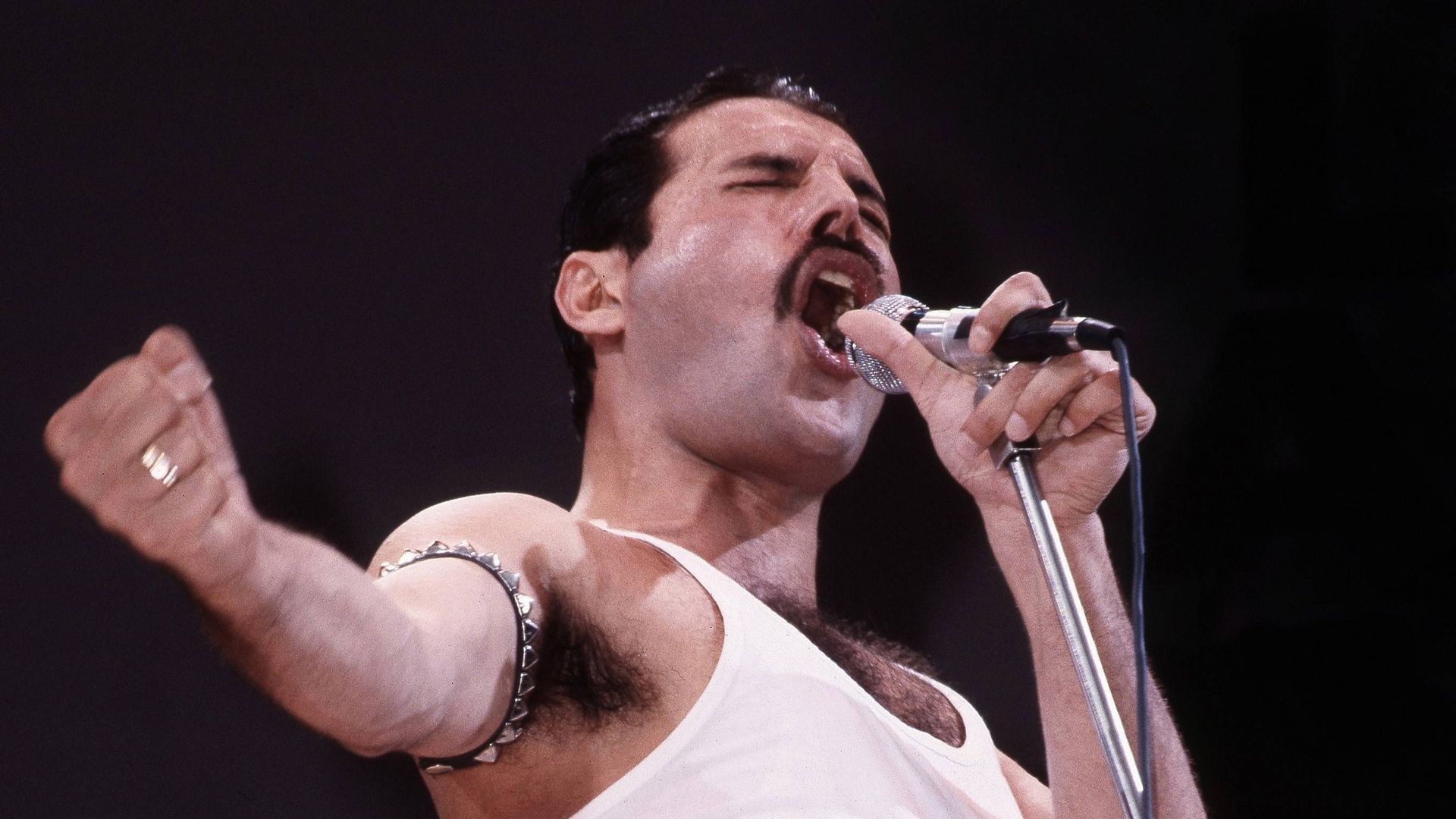 Freddie Mercury of Queen performs at Live Aid in 1985. 
