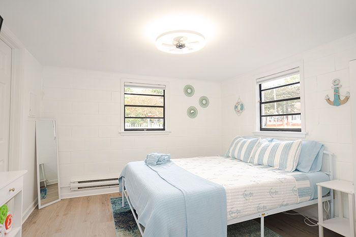 Bottom unit bedroom. Photo: Rico Marcelo/courtesy of Brandt and Rebecca Bronico