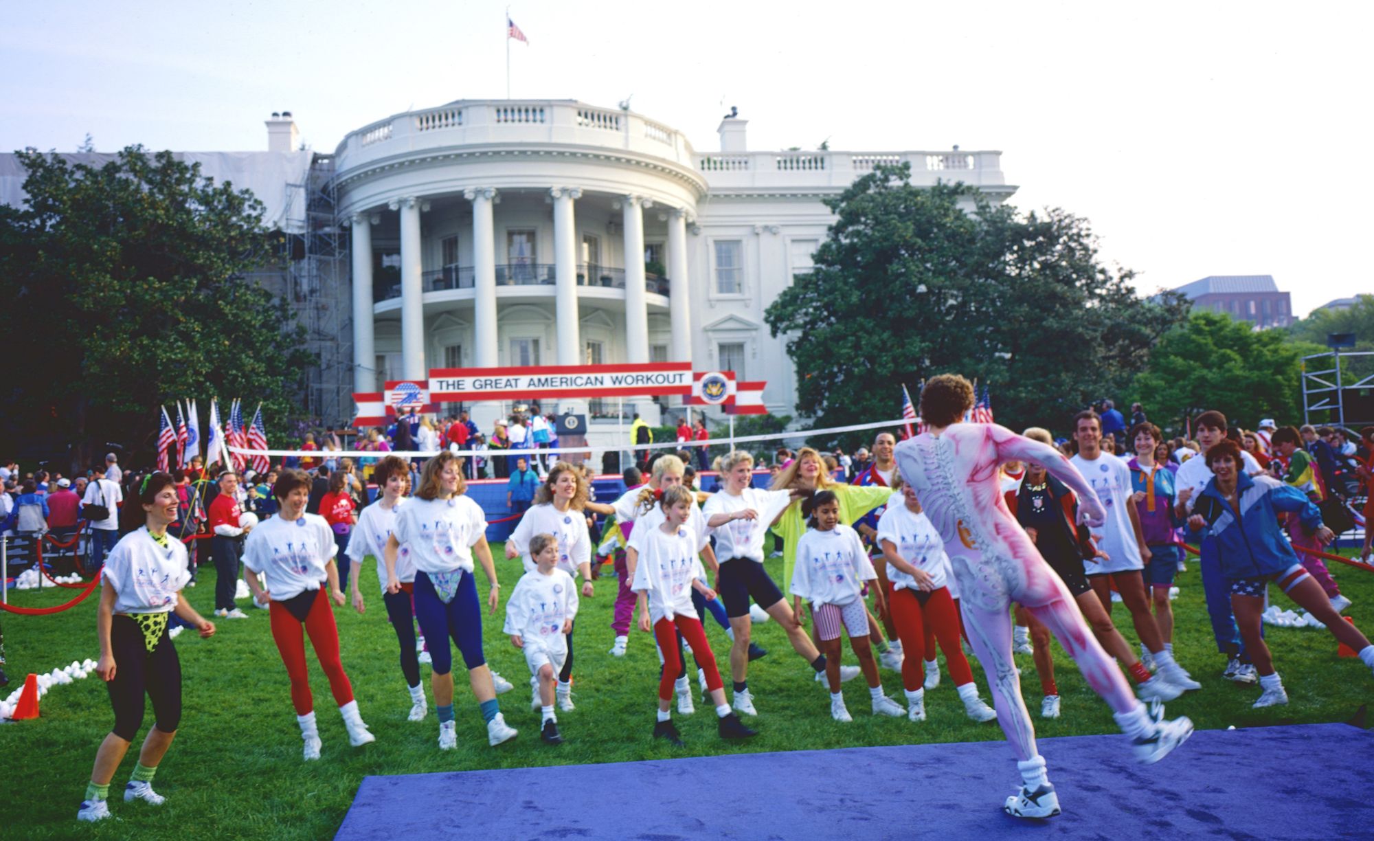 Early morning athletic training on the South Lawn of the White House as part of the 'Great American Workout,' part of President Bush's plan to encourage more physical fitness in school age children, Washington, DC, May 1,1992. (Photo by Mark Reinstein/Corbis via Getty Images)