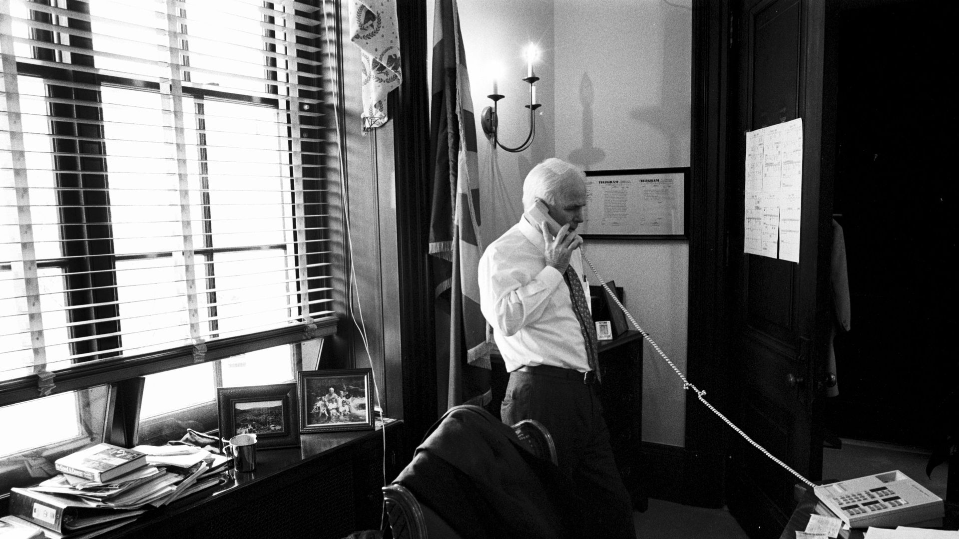 McCain on the phone in his office