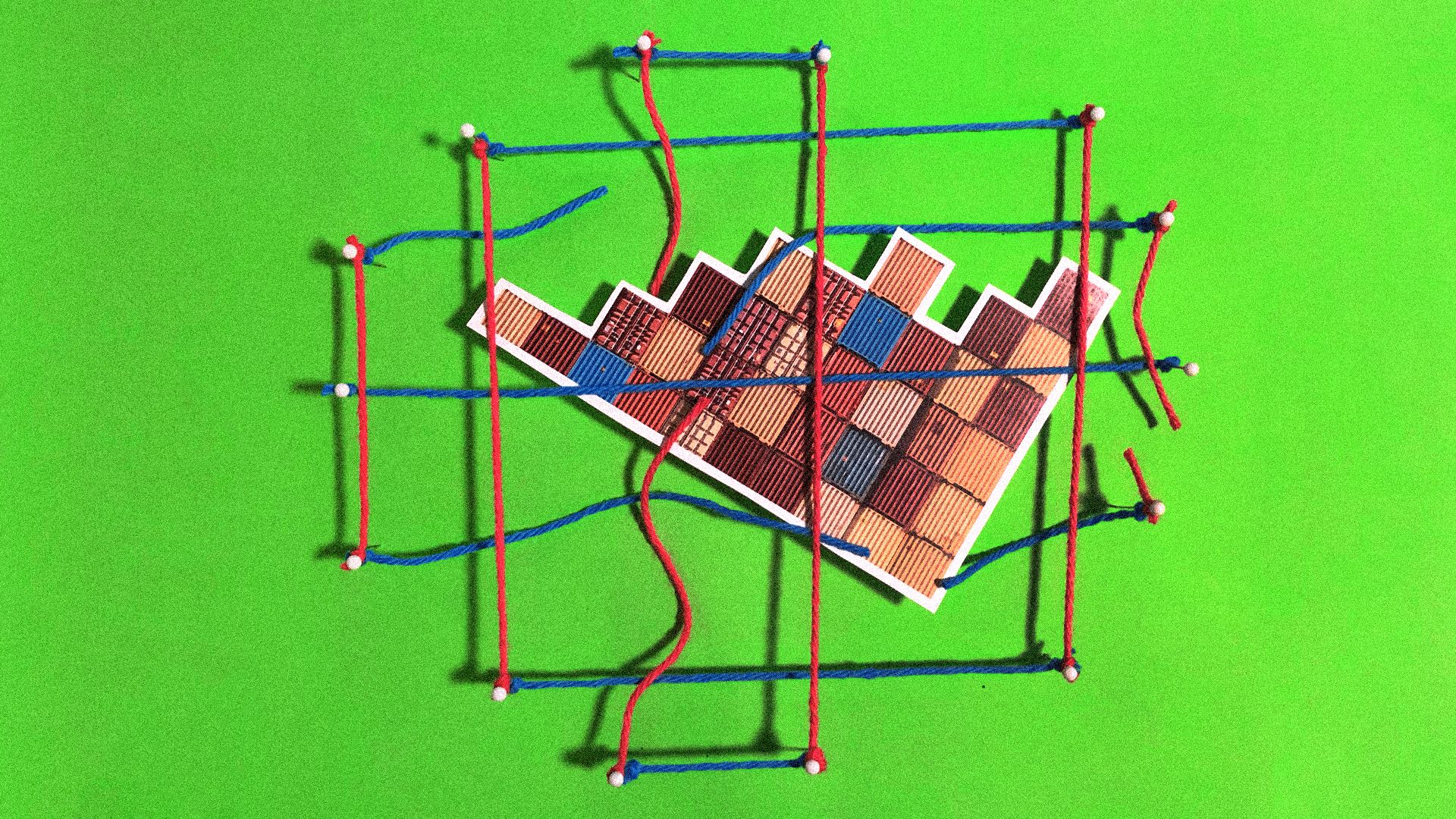 A photo of textiles with broken lines across it