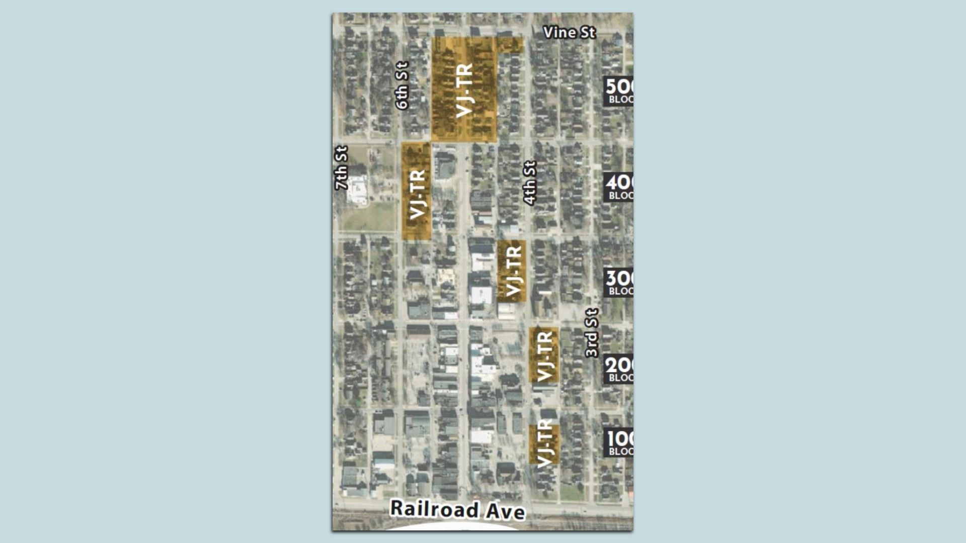 Aerial map showing blocks along Railroad Ave to Vine St with highlighted zones marked VJ-TR near 3rd to 7th Sts in a grid layout of buildings and streets.