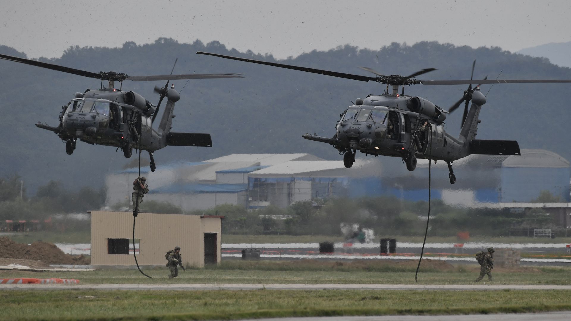 US soldiers participate in a military tactical demonstration during "Air Power Day" preview at US Osan Air Base in Pyeongtaek on September 20
