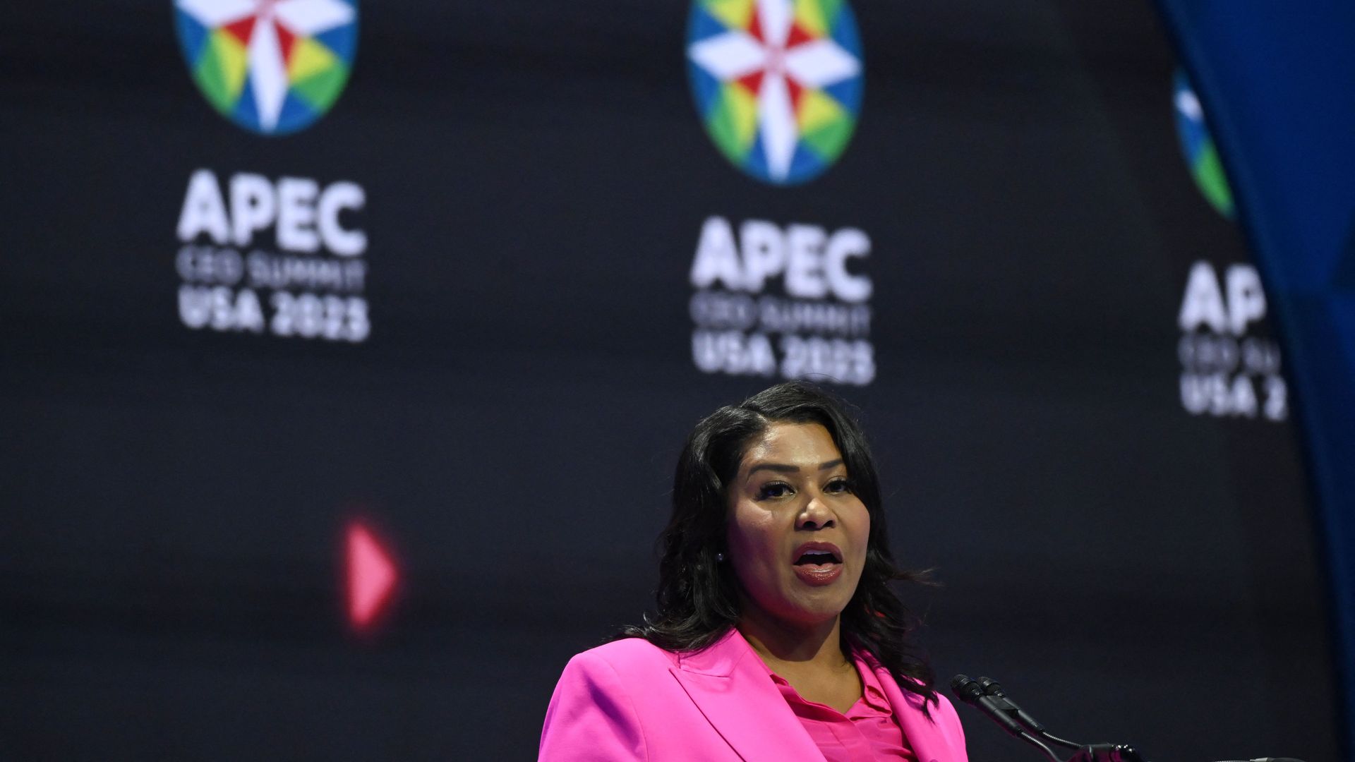 Photo of London Breed speaking on the APEC stage
