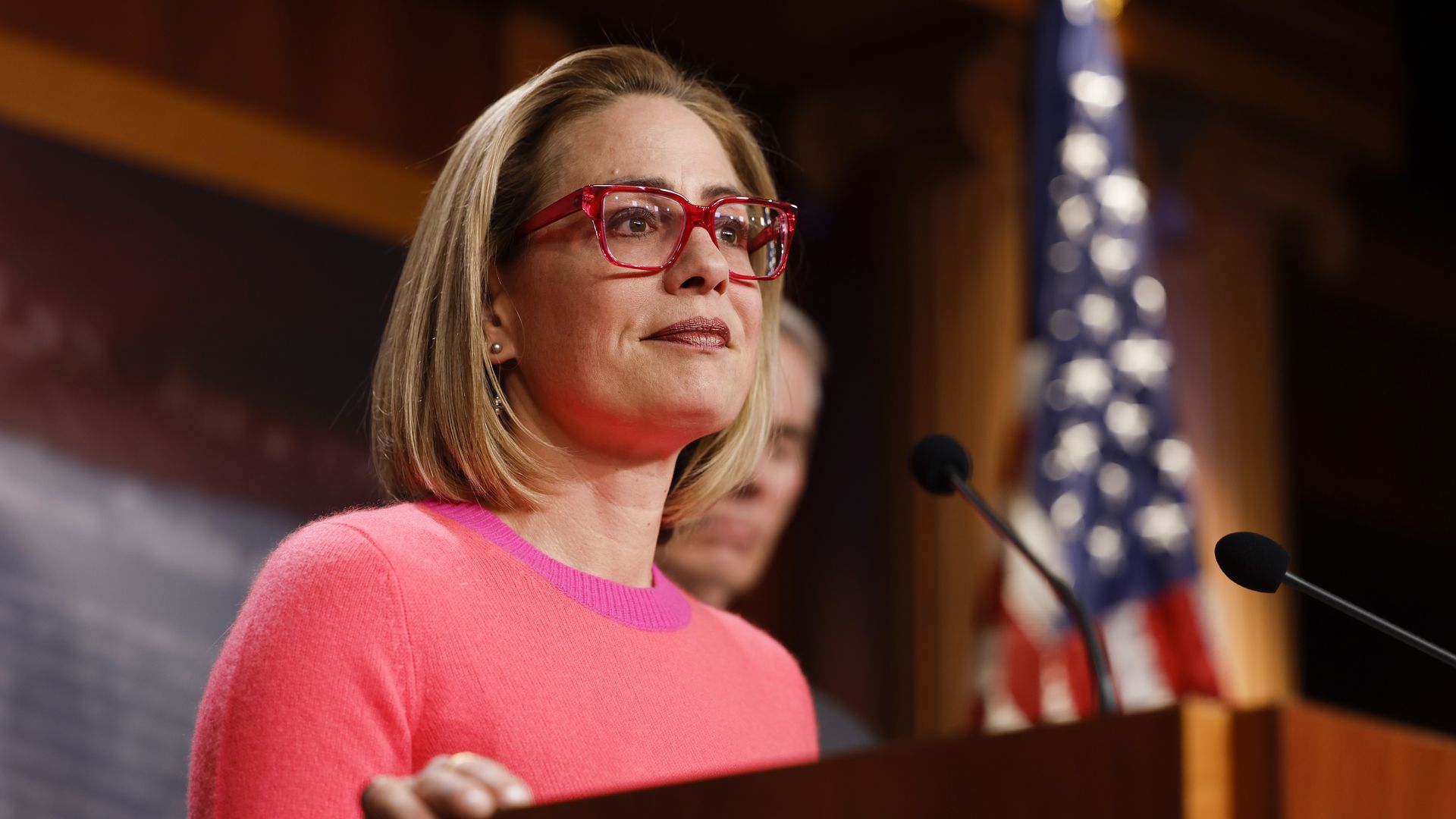 Sen. Kyrtsen Sinema (D-AZ) speaks at a news conference 