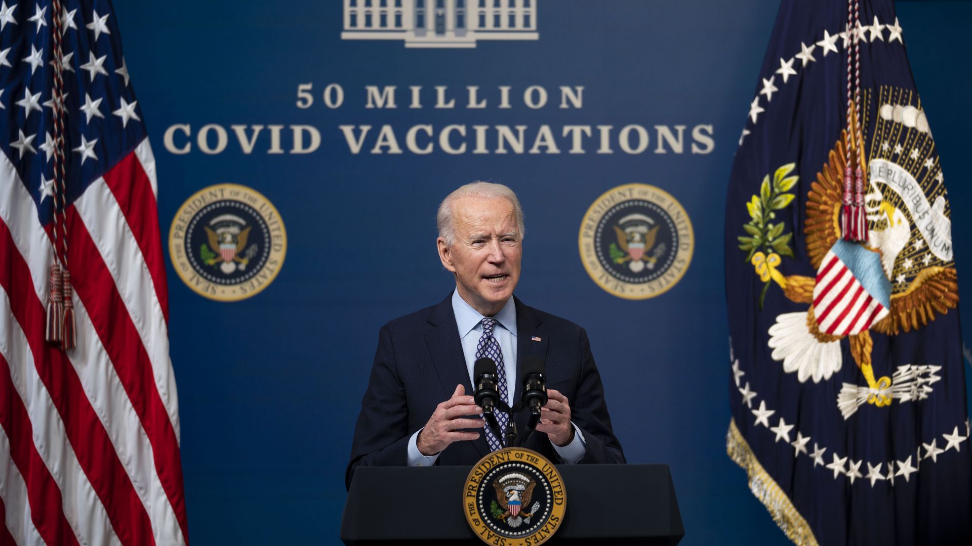 Joe Biden speaks during an event commemorating the 50 million COVID-19 vaccine shot