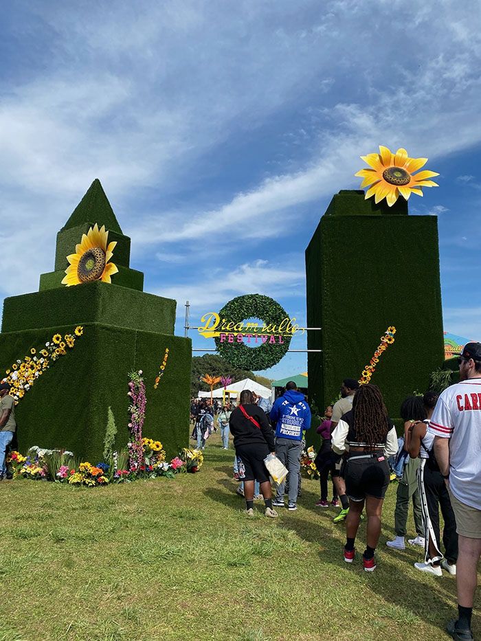 Fans walk into Dreamville Festival.
