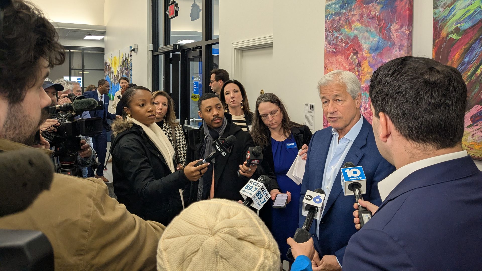 Jamie Dimon, JPMorganChase CEO, speaks to reporters at Chase's community center branch in Linden