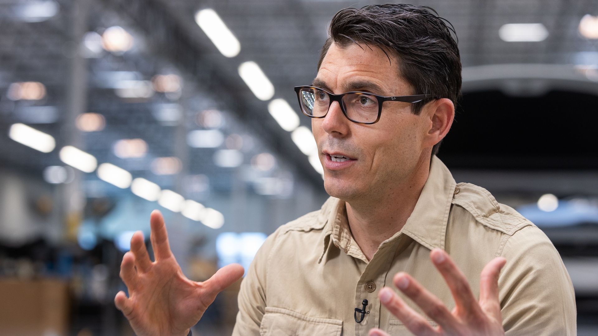 A photo of Rivian CEO RJ Scaringe during an interview at one of the automaker's assembly plants.
