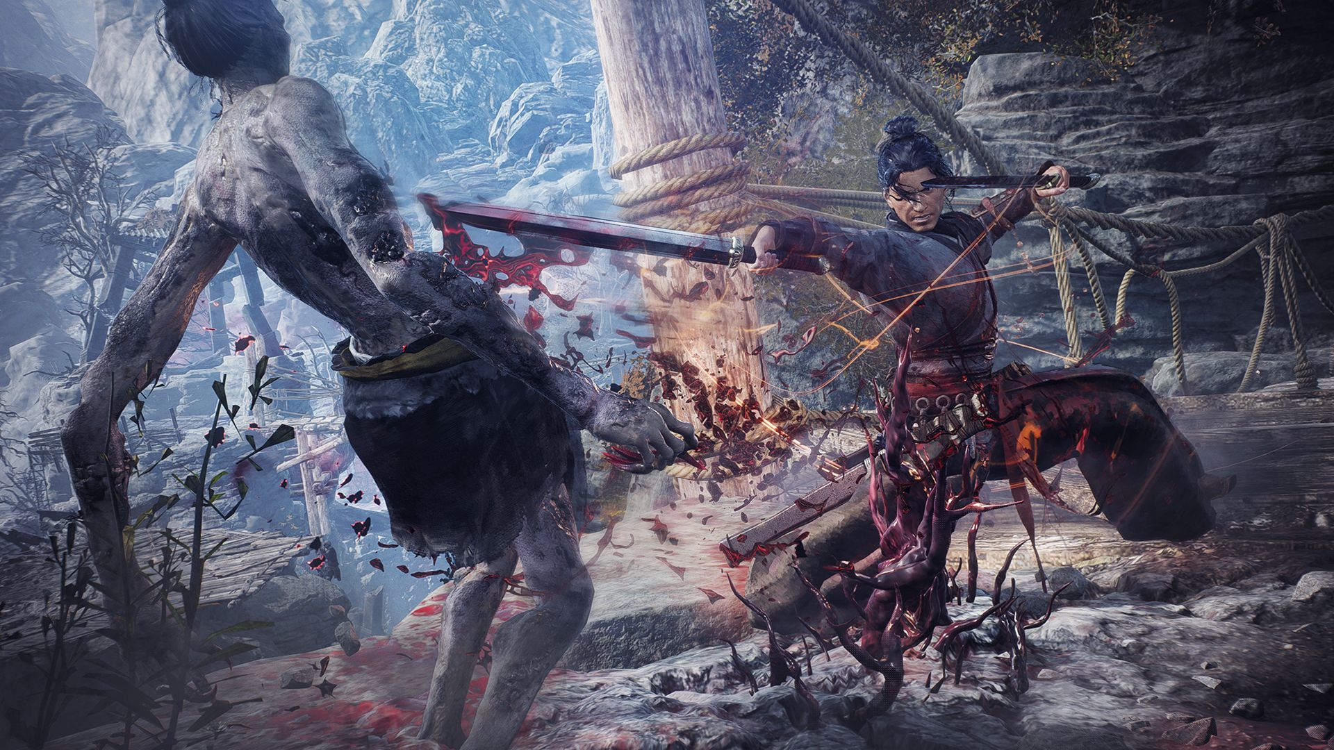 Video game screenshot of a man swinging a sword at a gray zombie