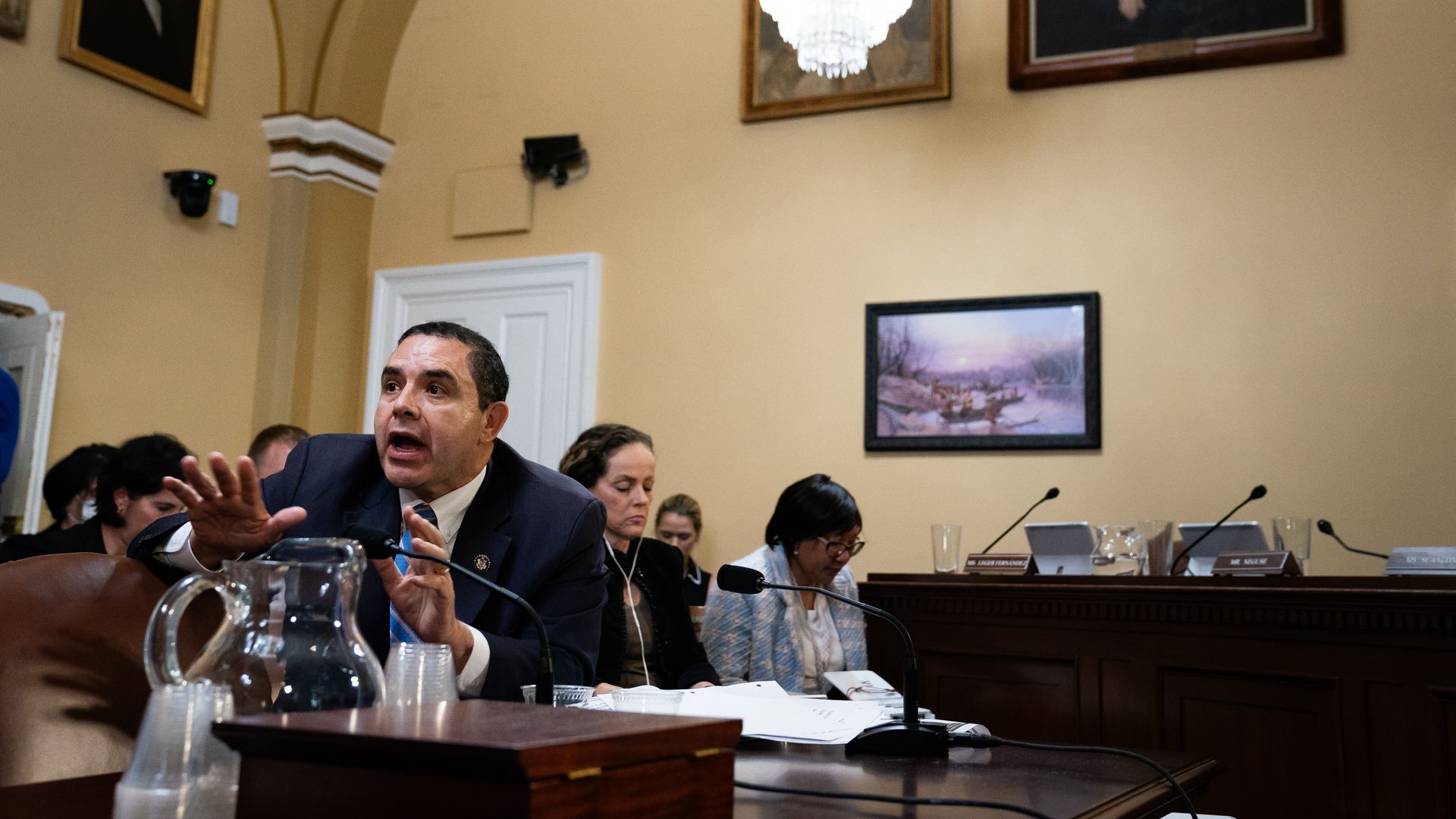 Rep. Henry Cuellar, wearing a blue suit and sitting in the Rules Committee chamber.
