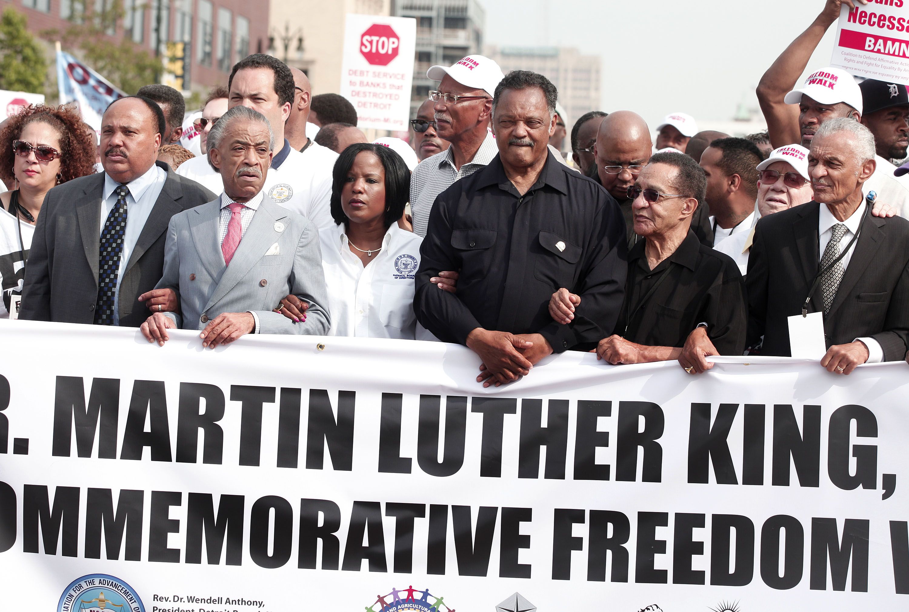 The Rev. Jesse Jackson, center, marched in 2013 in Detroit with Martin Luther King III, Rev. Al Sharpton and others at the 50th Anniversary Commemorative Freedom Walk.