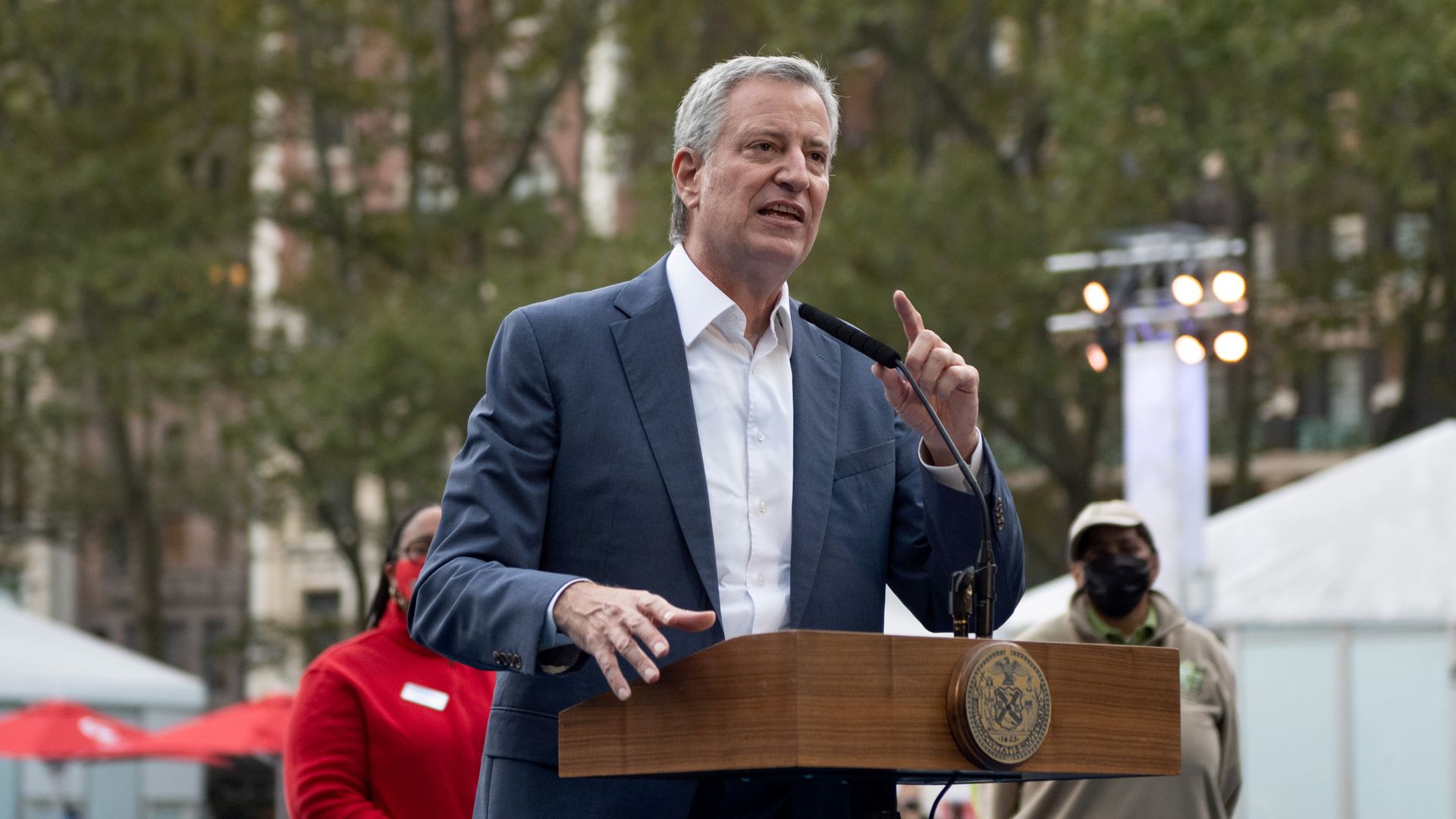 Picture of New York City mayor Bill de Blasio speaking on a podium