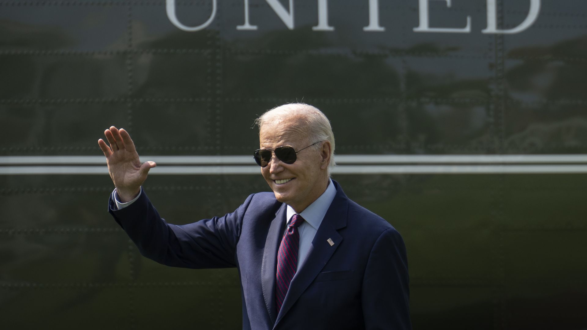 President Joe Biden waves toward visitors watching the departure as he walks to Marine One on the South Lawn of the White House July 28, 2023 in Washington, DC.