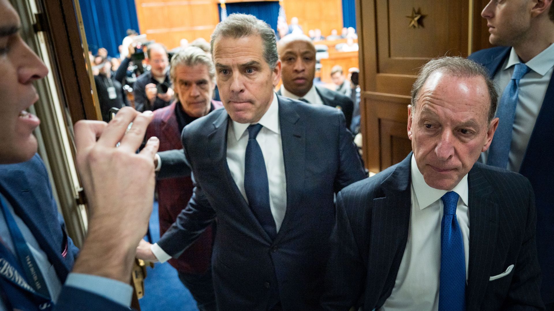  Hunter Biden (C), son of U.S. President Joe Biden, and his lawyer Abbe Lowell (R) depart a House Oversight Committee meeting at Capitol Hill on January 10, 2024 in Washington, DC. The committee is meeting today as it considers citing him for Contempt of Congress. 