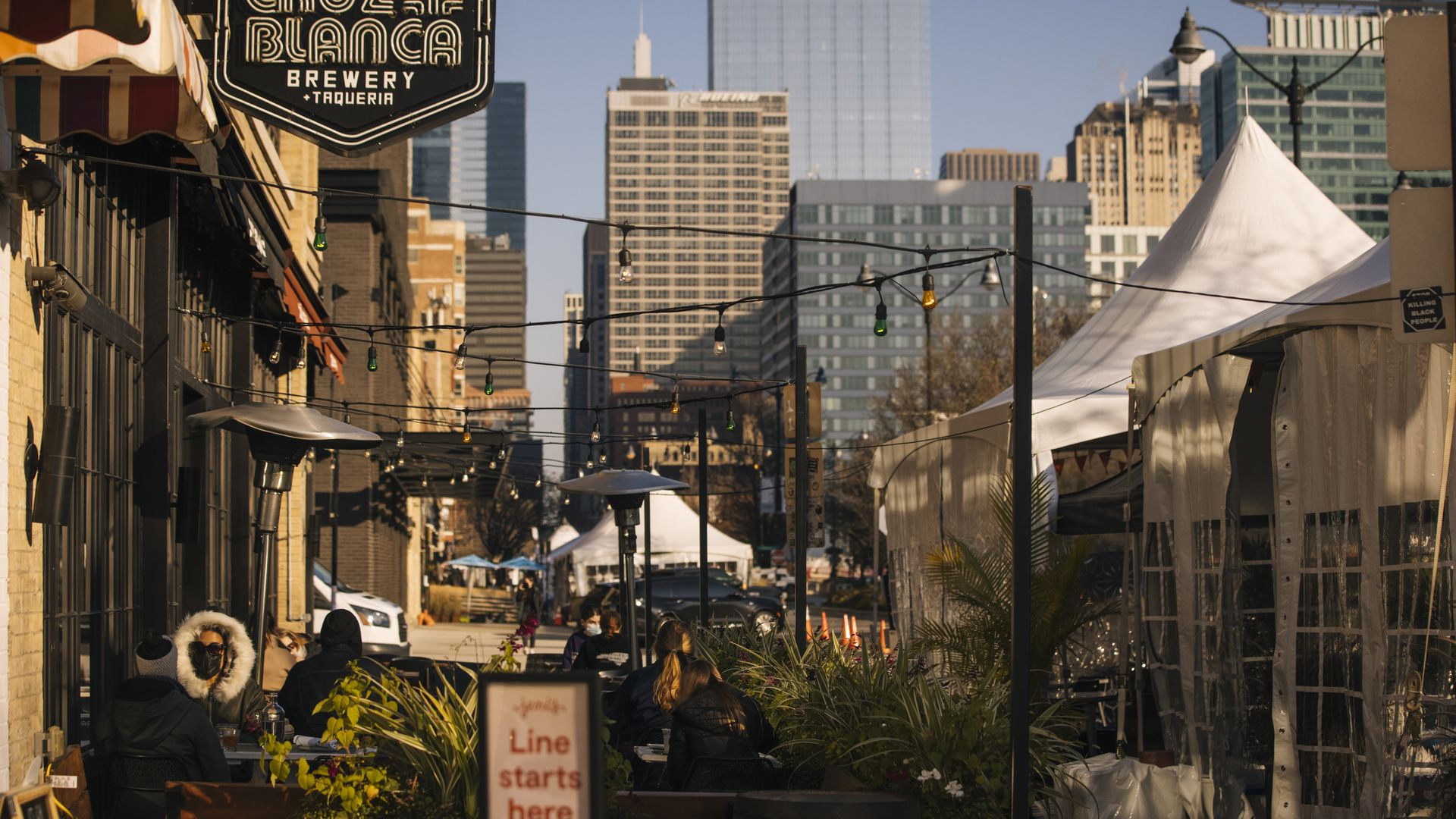 Photo restaurants lining the street. 