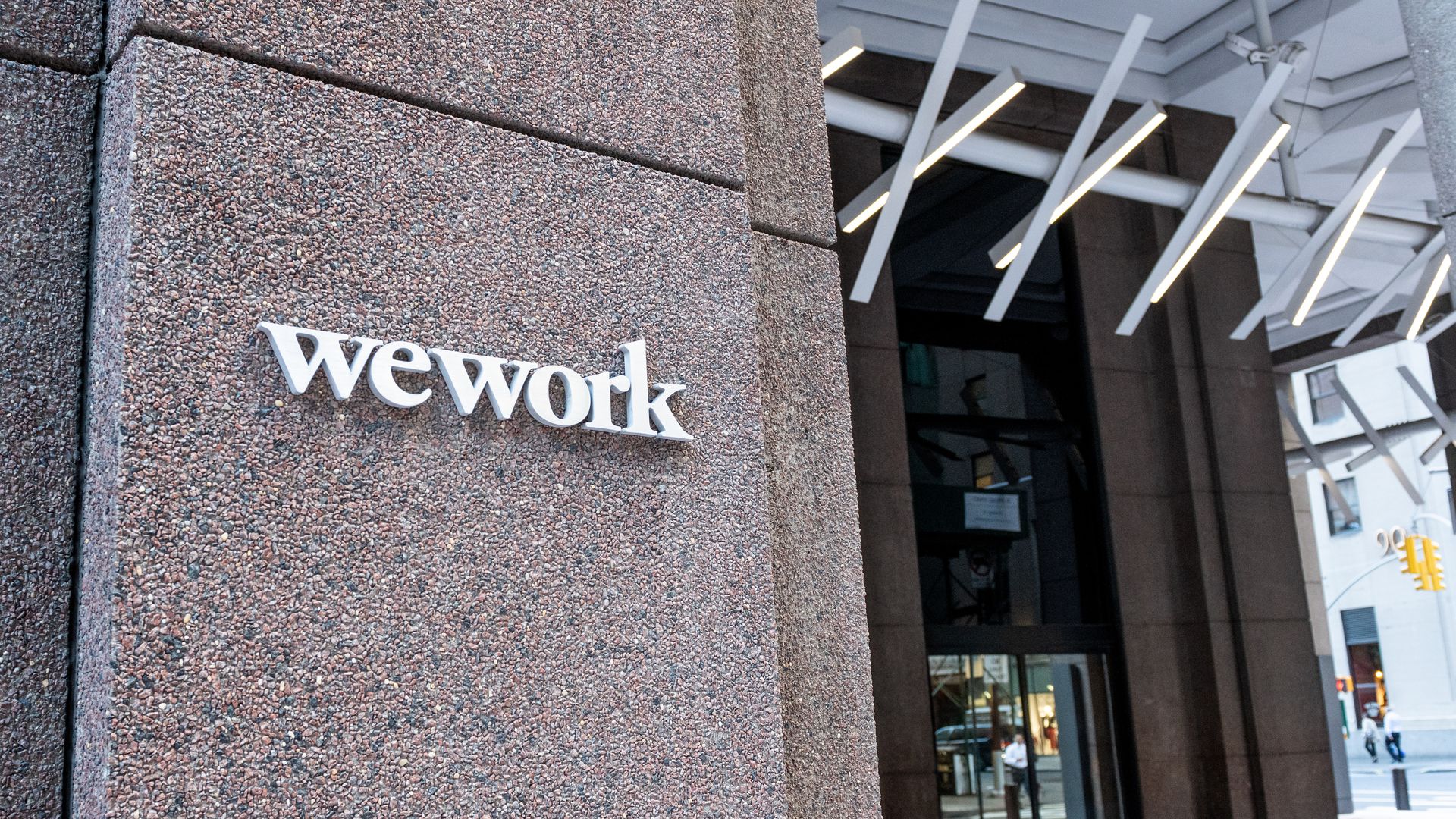 Photo of a WeWork sign on one of its New York buildings.