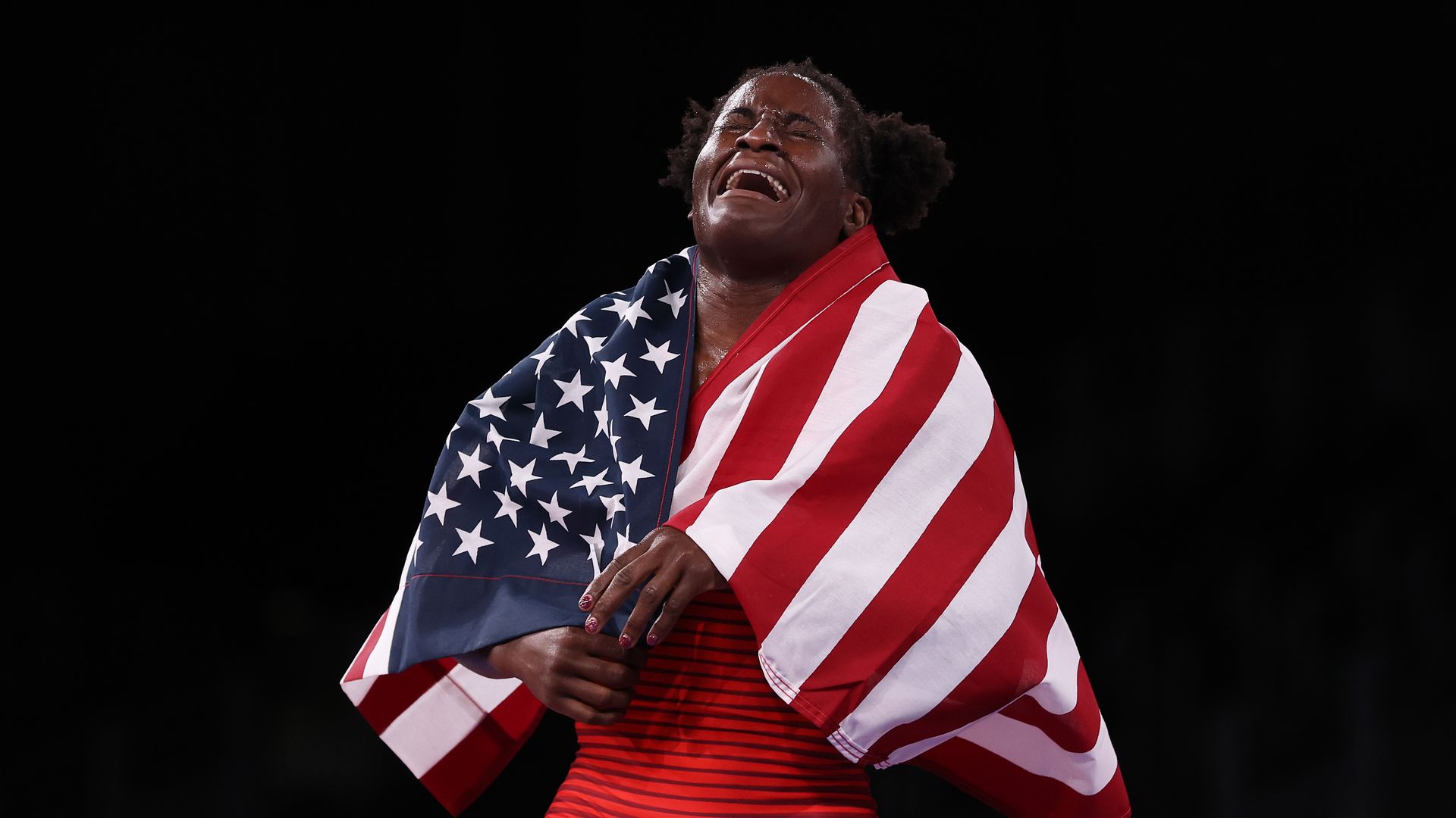 USA's Tamyra Mariama Mensah-Stock  celebrates beating Blessing Oborududu of Nigeria in the Women's Freestyle 68kg Gold Medal Match at the Olympic Games on August 03, 2021 in Chiba, Japan.