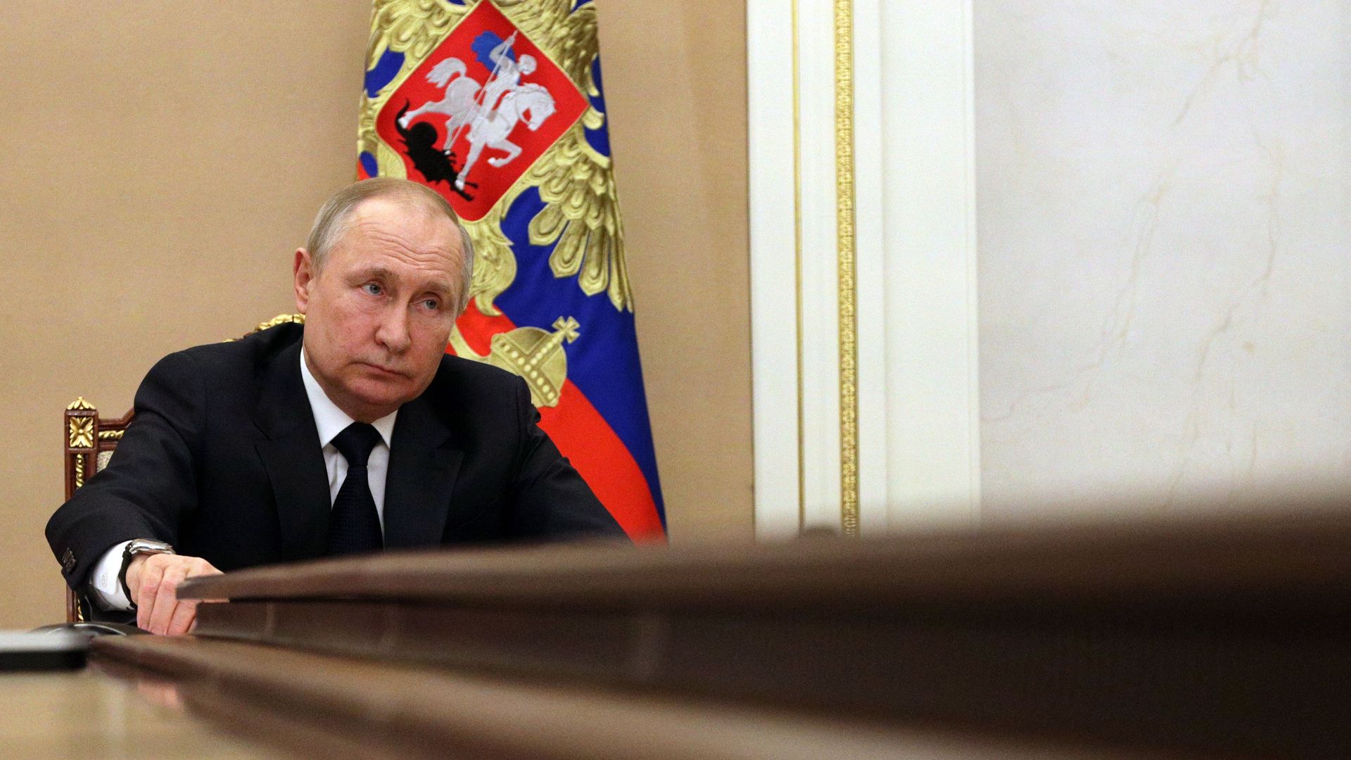 Russian President Vladimir Putin chairs a meeting with members of the Russian government via teleconference in Moscow on March 10.