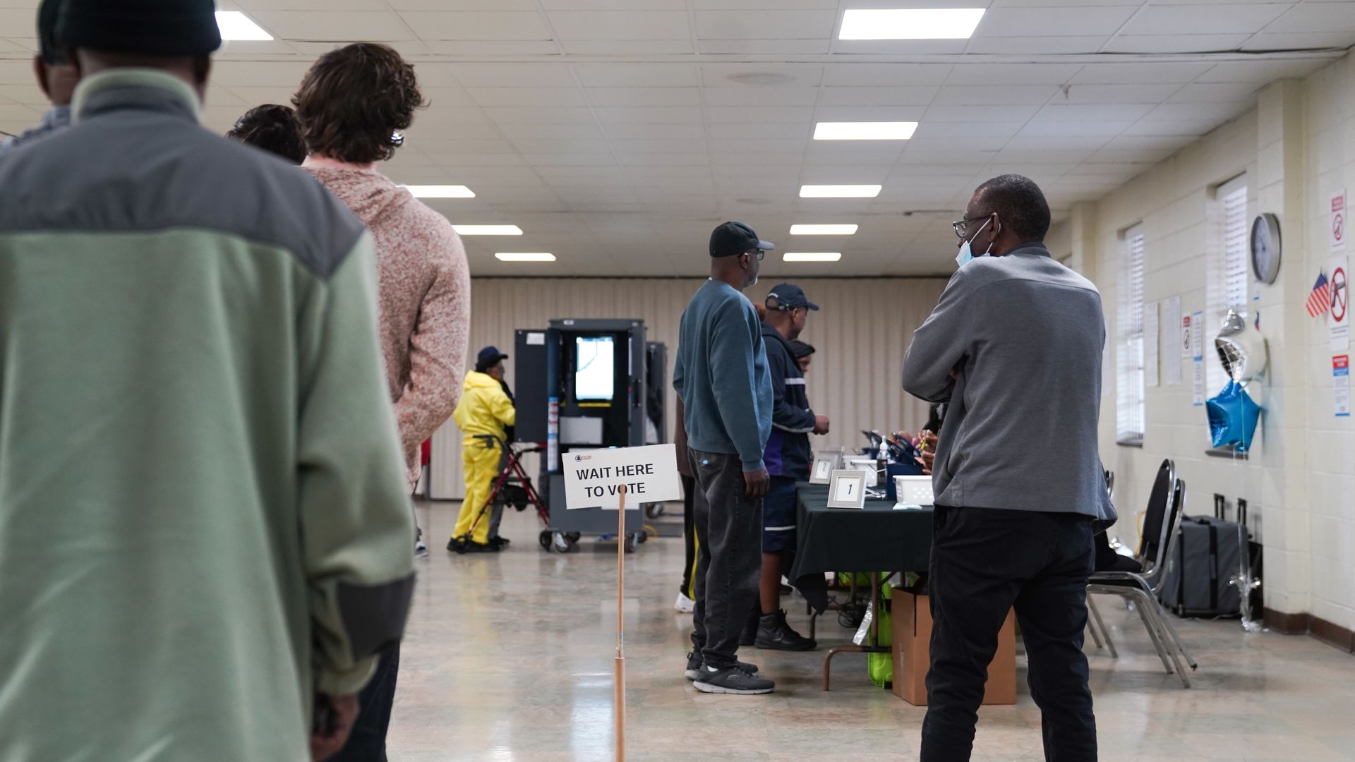 People cast their votes on the first day of early voting at East Point First Mallalieu United Methodist Church on October 15, 2024 in Atlanta, Georgia. Early voting takes place from October 15 - November 1, ahead of Election Day on November 5. 