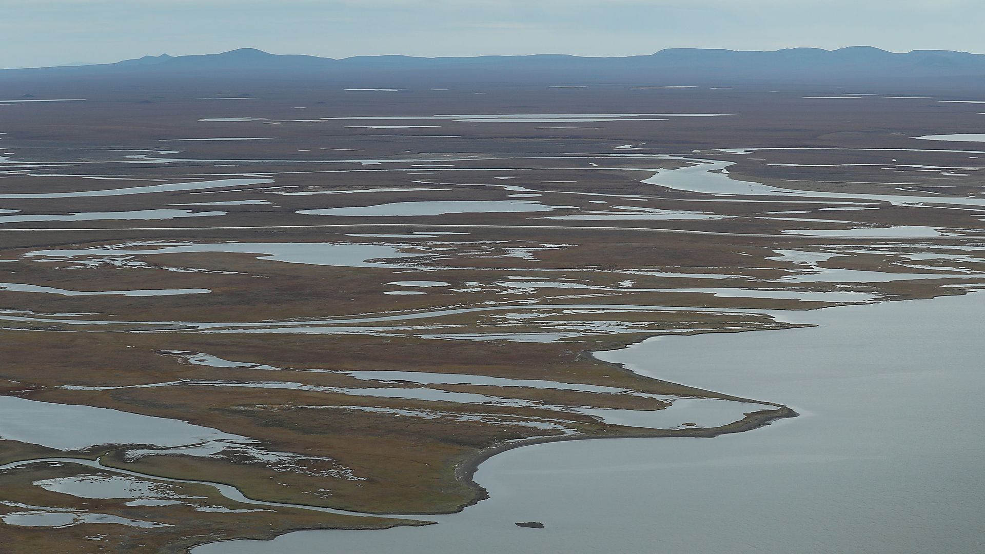 Aerial view of Arctic tundra near Kivalina, Alaska, where permafrost thaw has been observed.