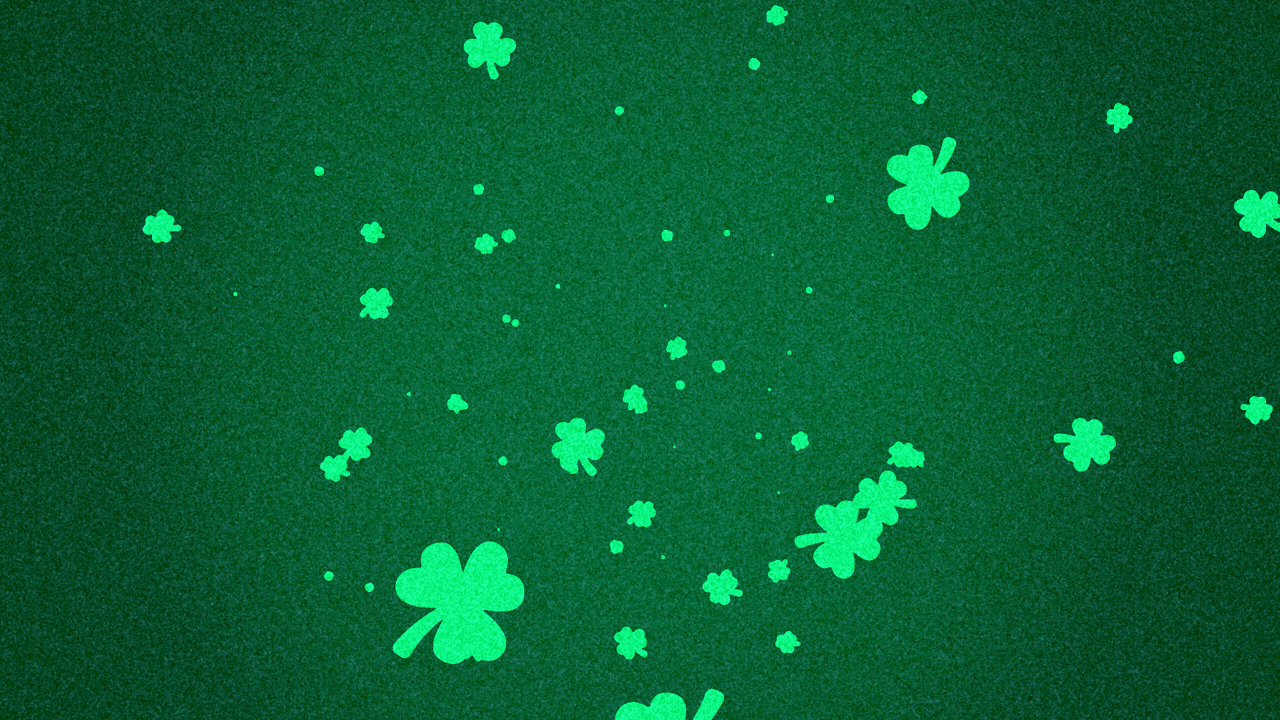 Animated illustration of a lot of shamrocks flying at you.