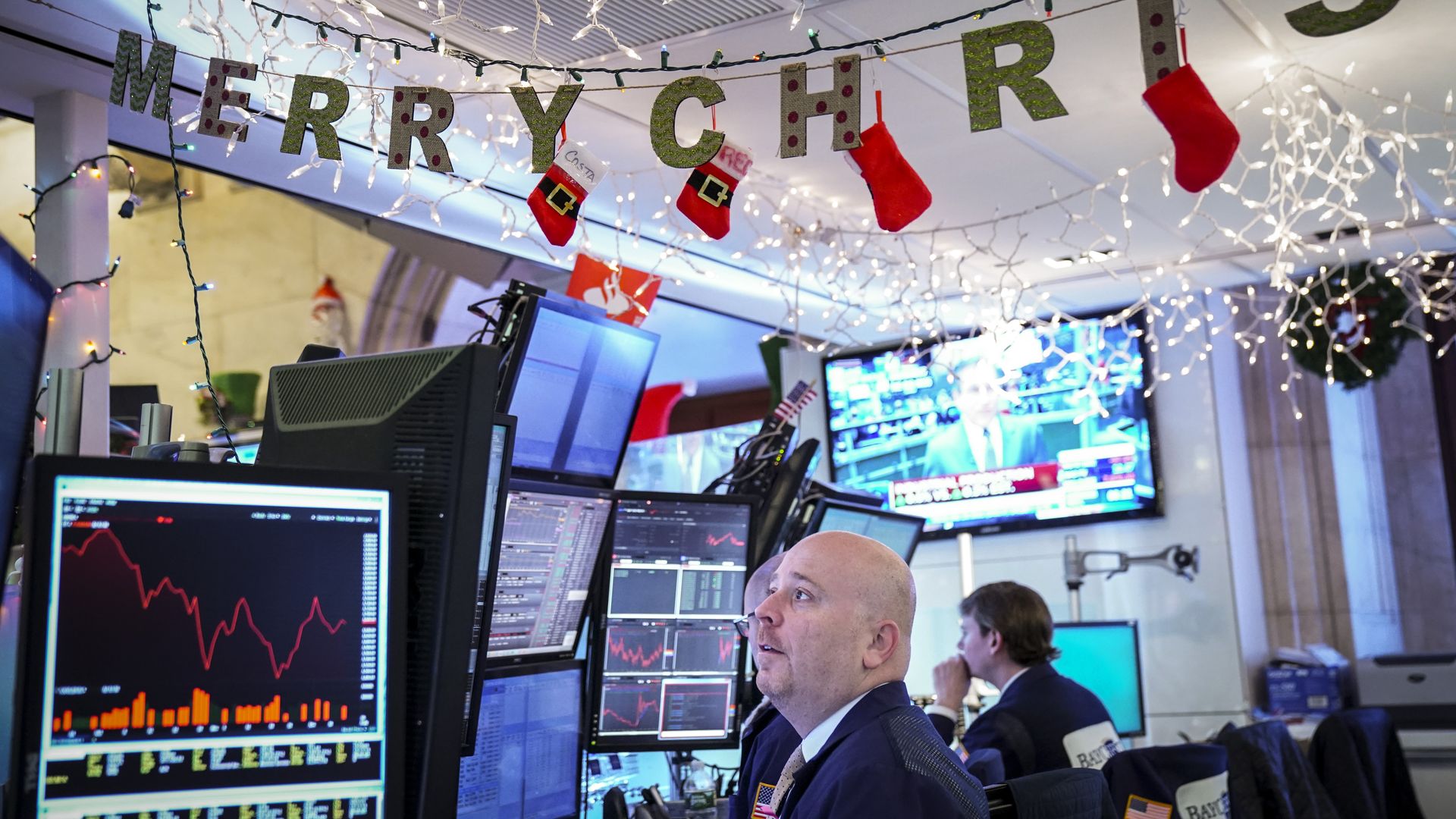 NEW YORK, NY - DECEMBER 14: Traders and financial professionals work at the opening bell on the floor of the New York Stock Exchange (NYSE), December 14, 2018 in New York City