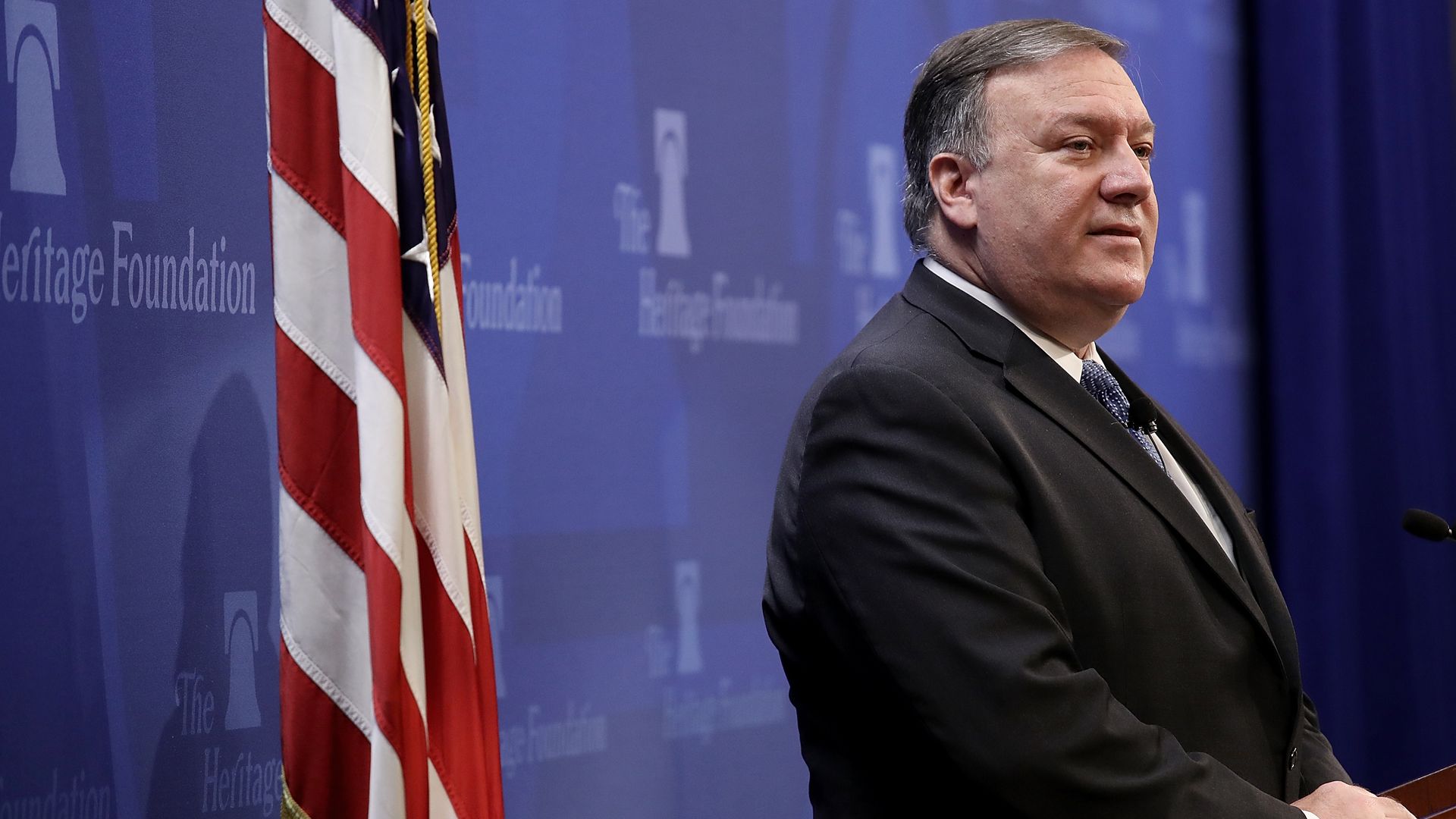 Mike Pompeo at lectern with American flag