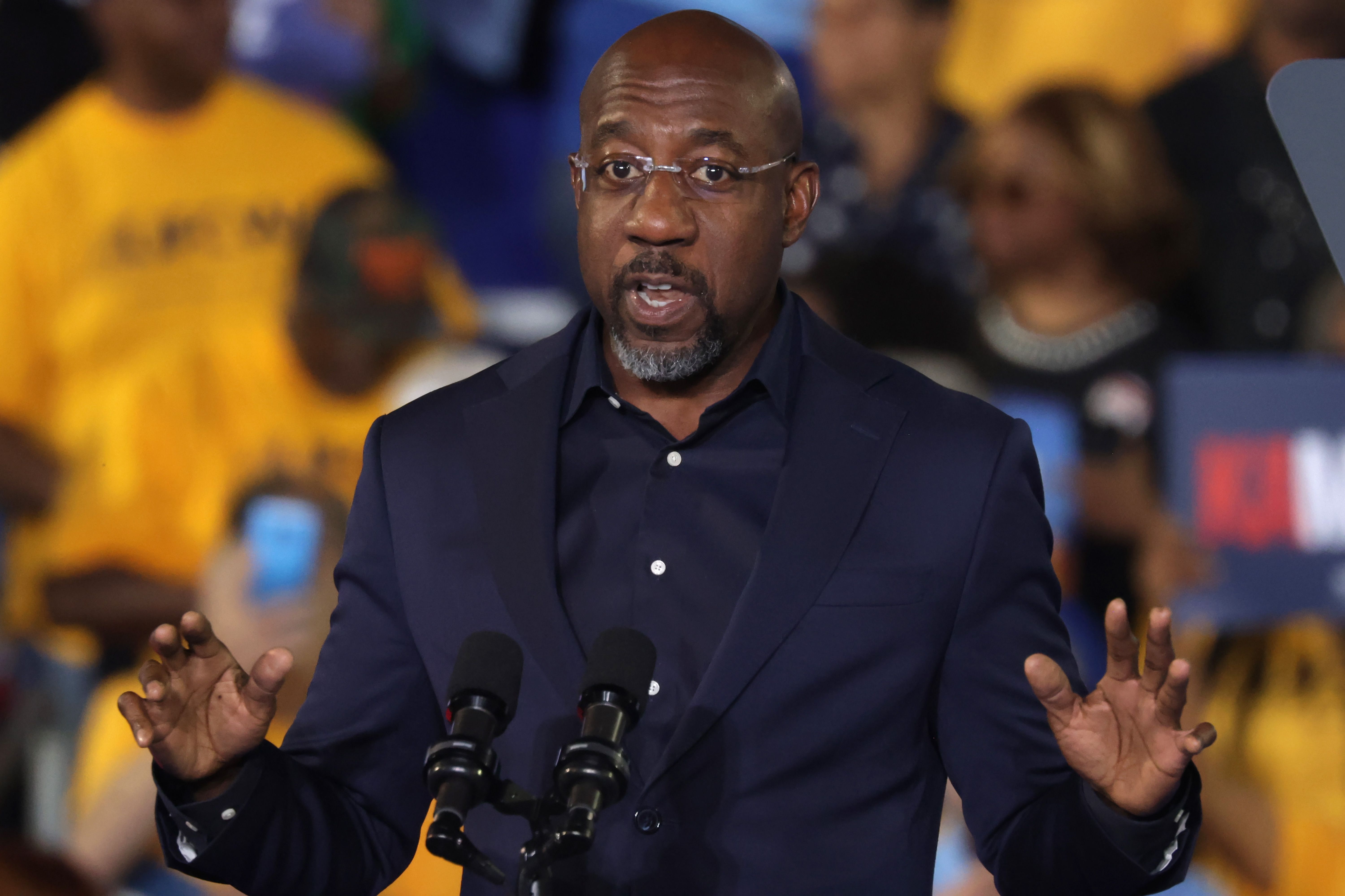 CLARKSTON, GEORGIA - OCTOBER 24: Sen. Raphael Warnock (D-GA) speaks during a campaign event for Democratic presidential nominee, U.S. Vice President Kamala Harris, at the James R Hallford Stadium on October 24, 2024 in Clarkston, Georgia. Harris and Republican presidential nominee, former U.S. Presi