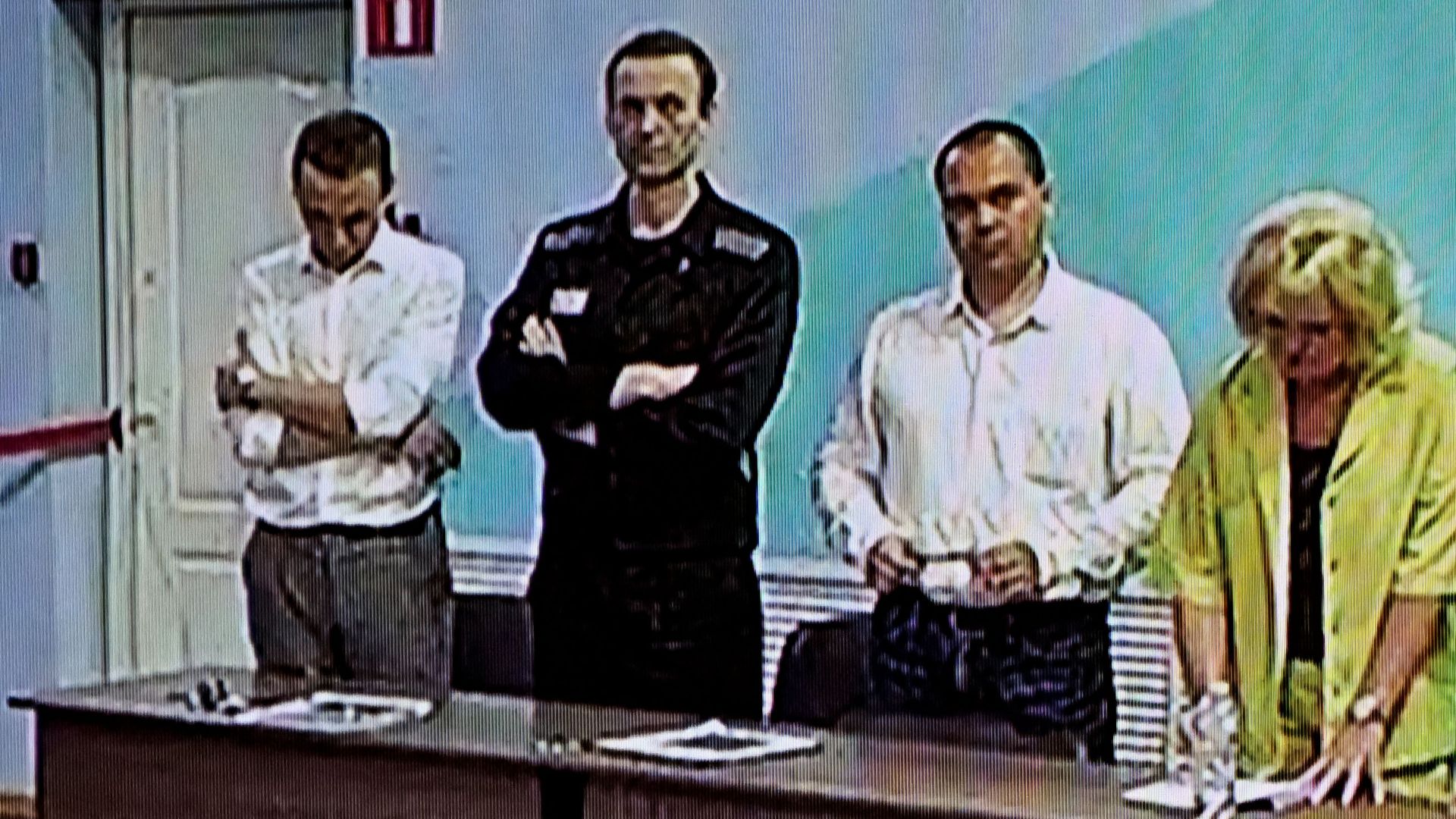 Russian opposition leader Alexei Navalny, second from the left, with his legal team in a penal colony east of Moscow in August 2023.