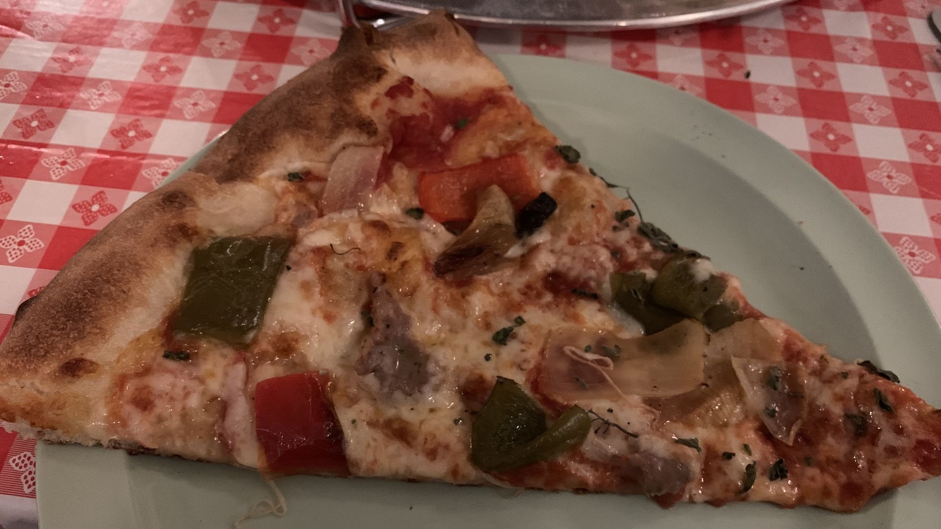 photo of slice of pizza