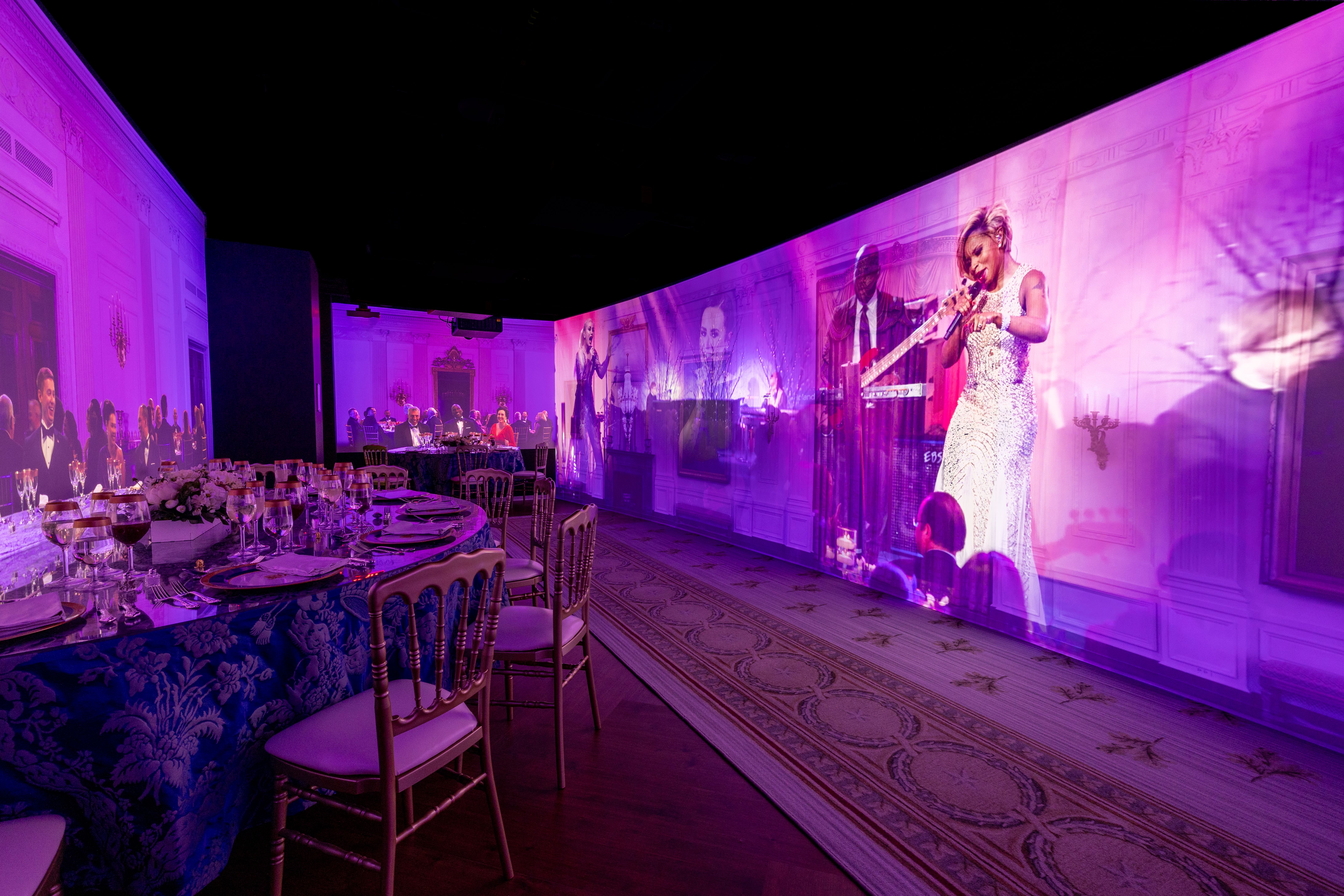 A photo of an immersive experience that lets visitors feel like they're attending a State Dinner at the White House.