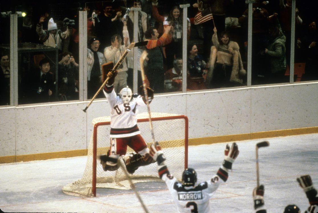 Hockey goalie celebrating
