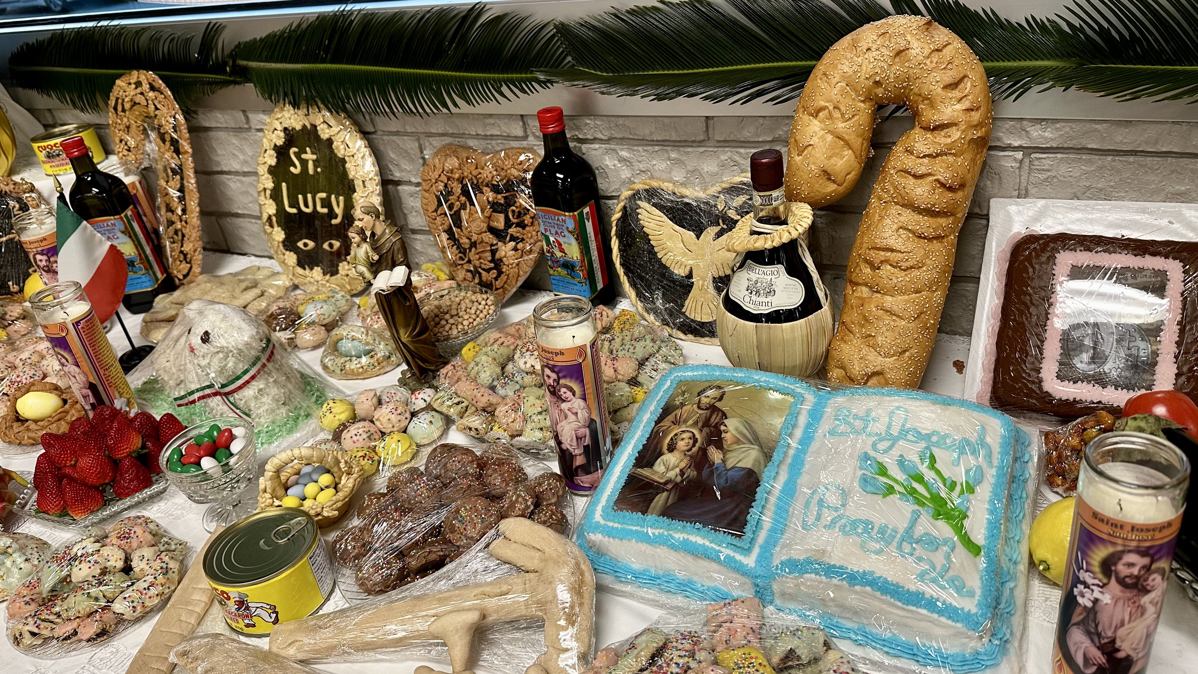 Photo shows bread shaped like a cane at the St. Joseph's Day altar at Dorignac's