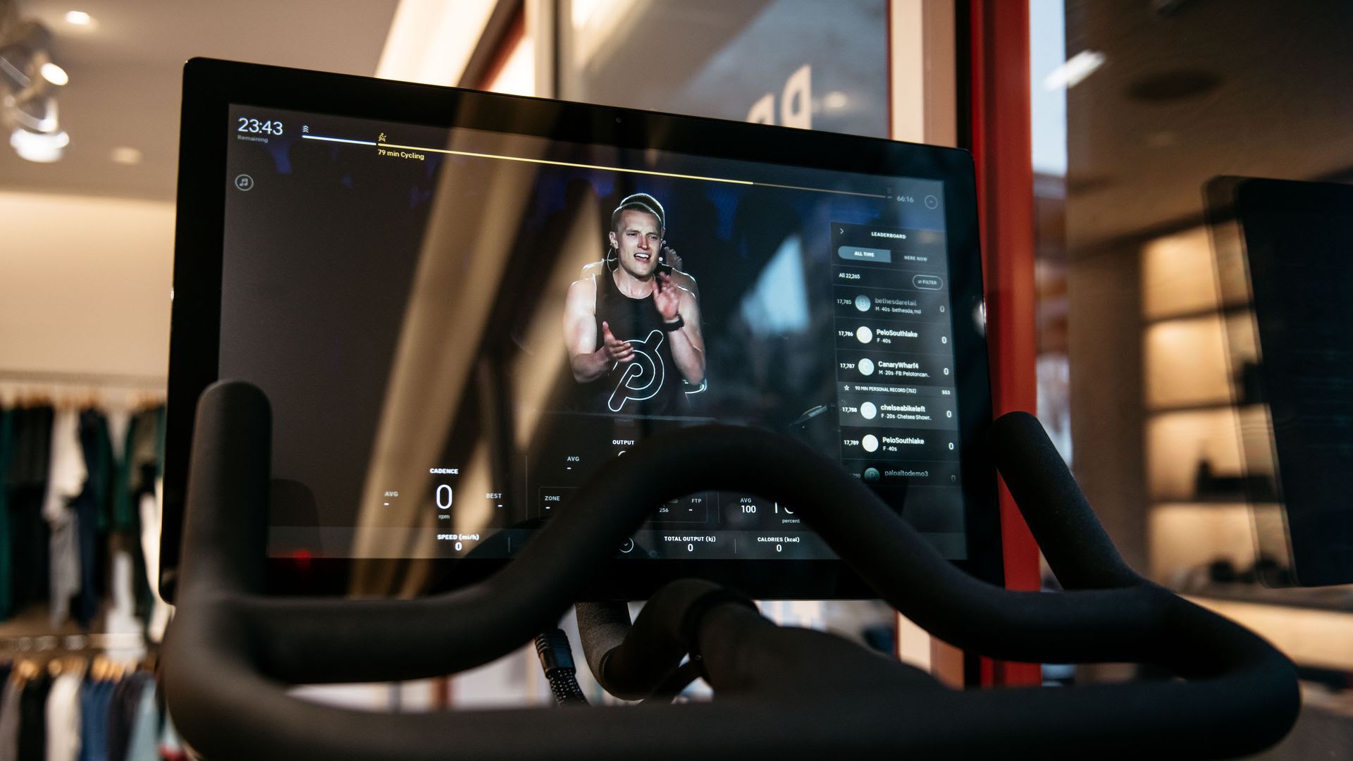 A trainer on a Peloton screen during a workout