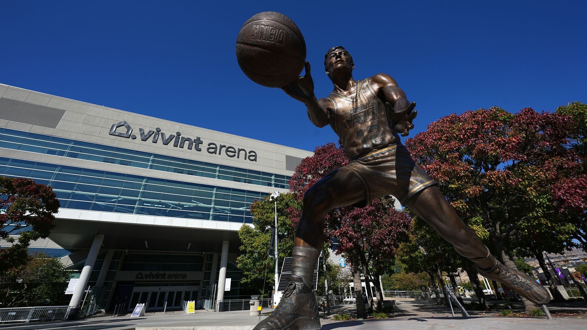 A statue in front of Vivint Arena.