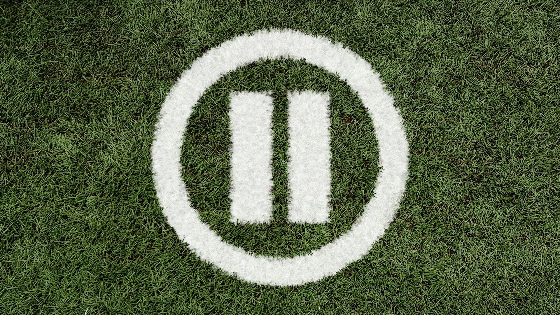 Illustration of a pause-button symbol painted on a grass field.