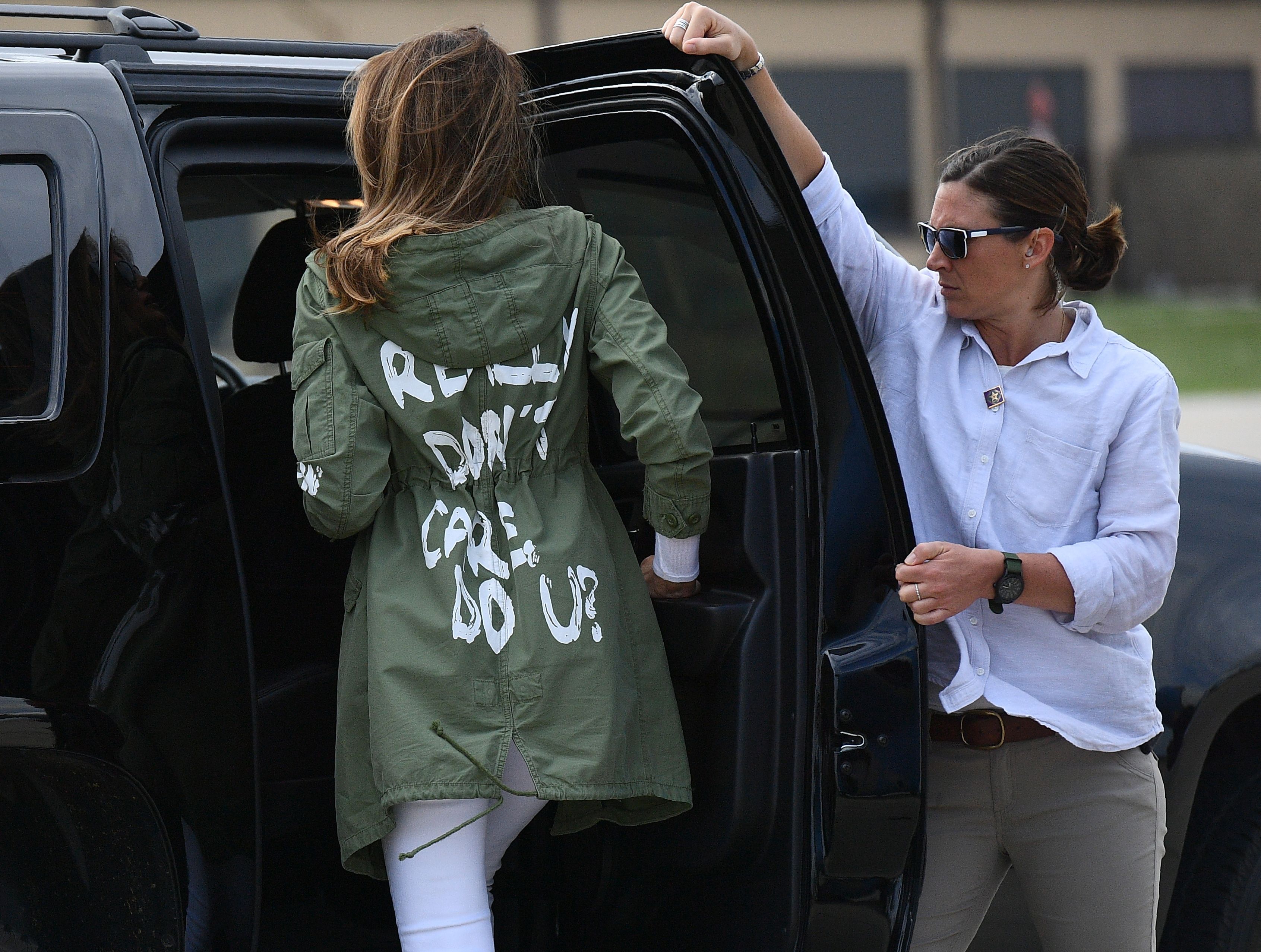 Melanie Trump is seen wearing a jacket reading "I Really Don't Care. Do U?"