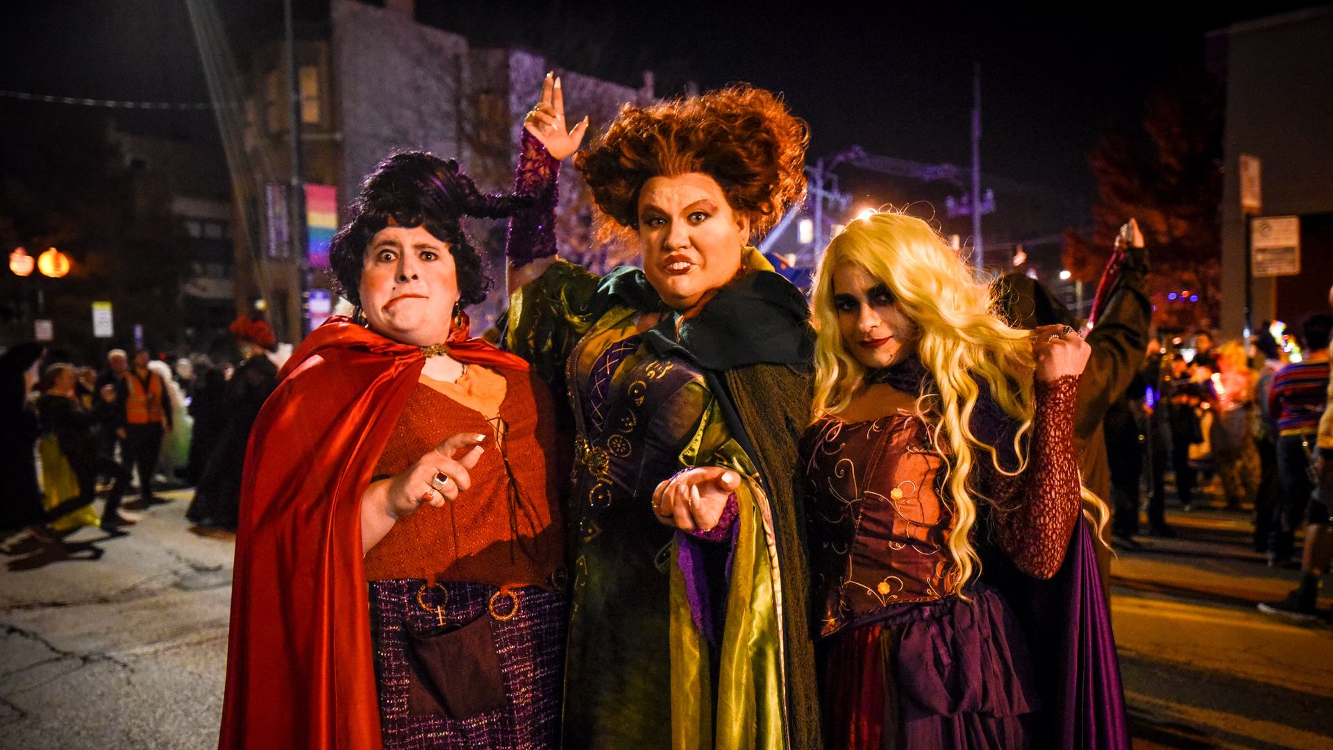 A photo showing three people dressed up like the characters in "Hocus Pocus" standing outside.