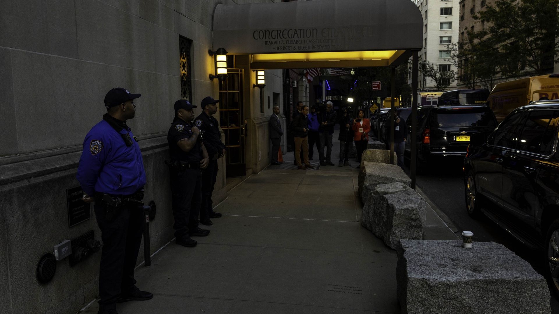 Police officers outside of a synagogue in New York City on Oct. 13.