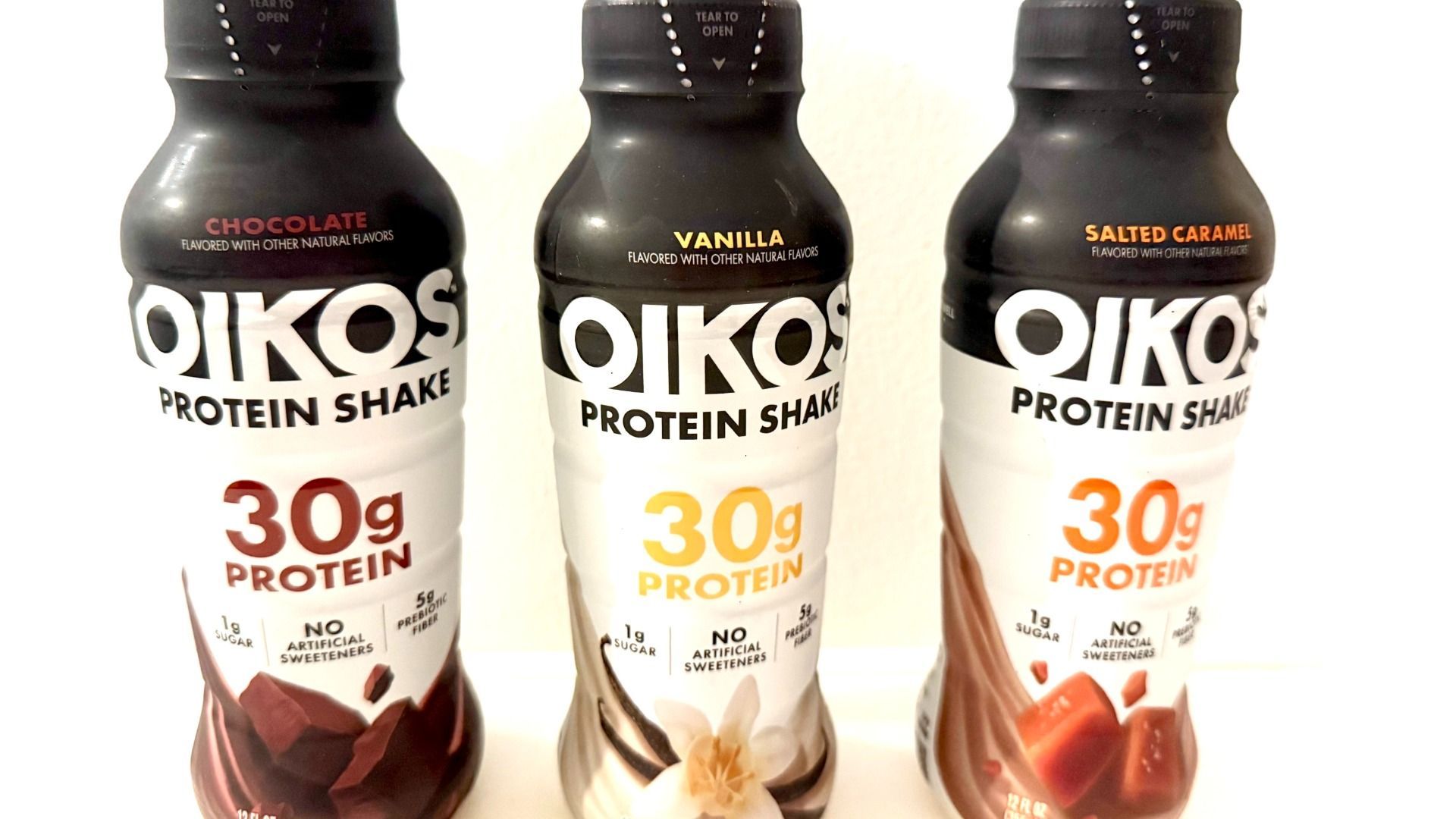 An image showing bottles of Oikos protein shakes