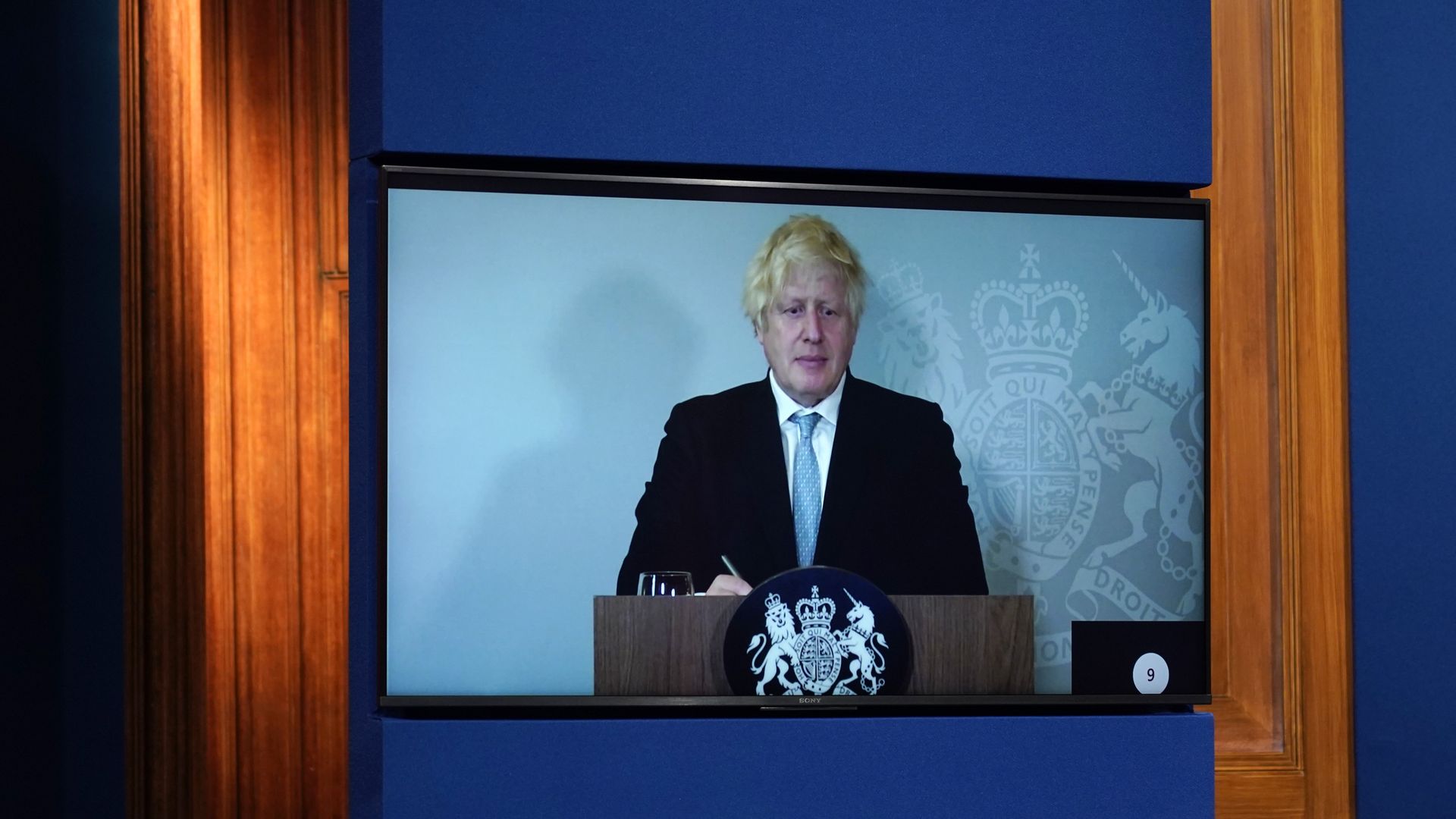Boris Johnson attends a media briefing on coronavirus online